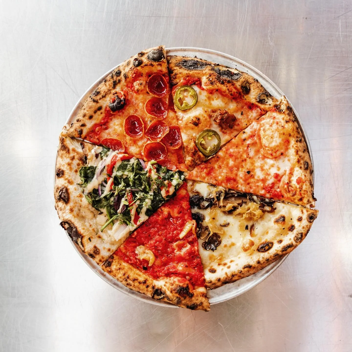 If you ever can't decide and want one of each flavor, check out our late night slice shop inside @thedewdropinndc , Bare Bones, from 11pm-close Friday &amp; Saturday nights! We have extra large slices available in a variety of options for those extra