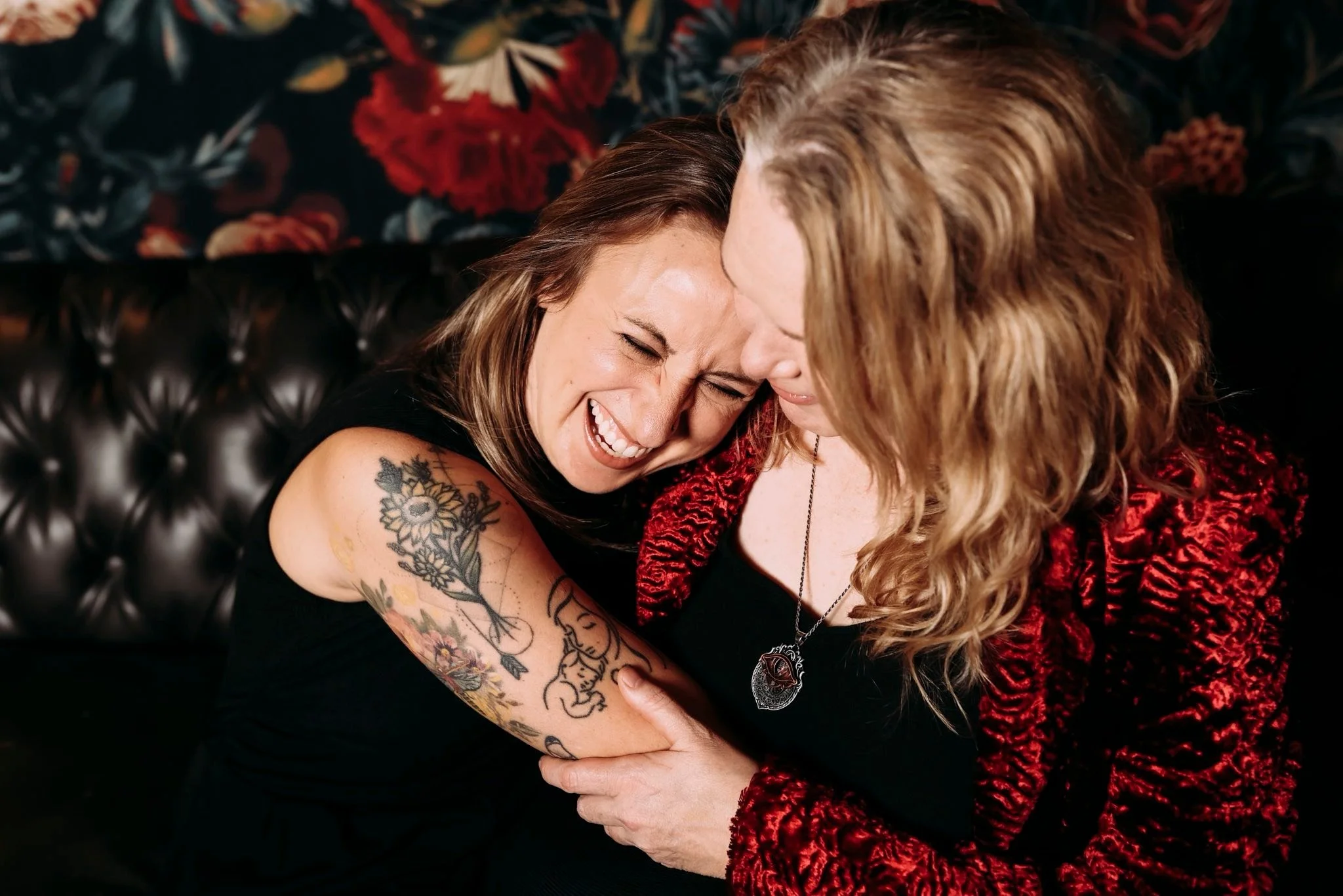 lesbian couple in a playful embrace indianapolis couples boudoir