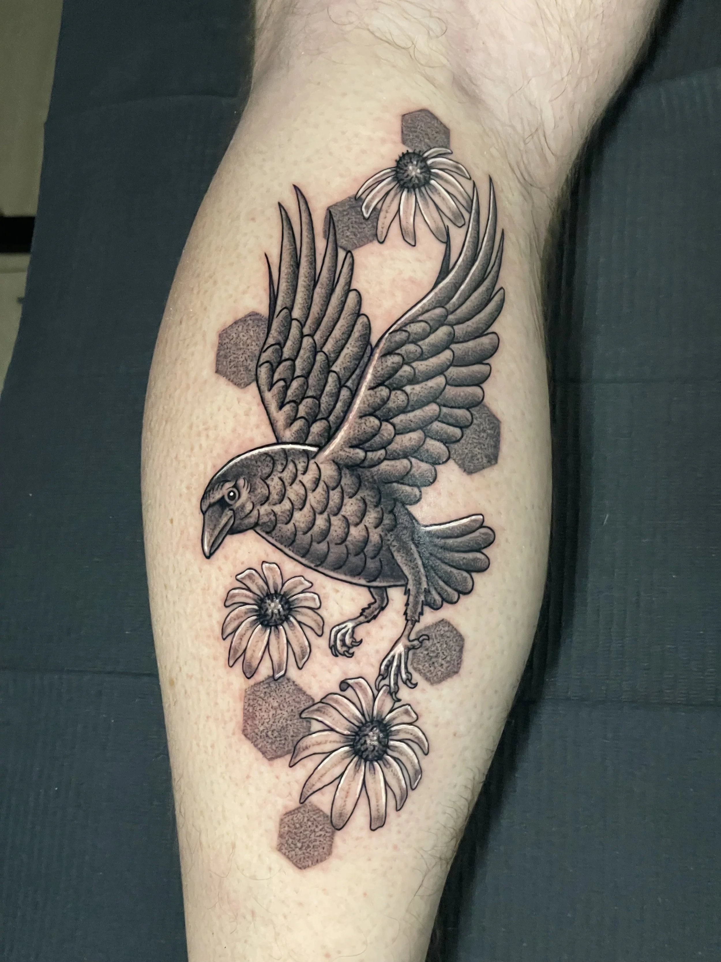 black bird tattoo with flowers