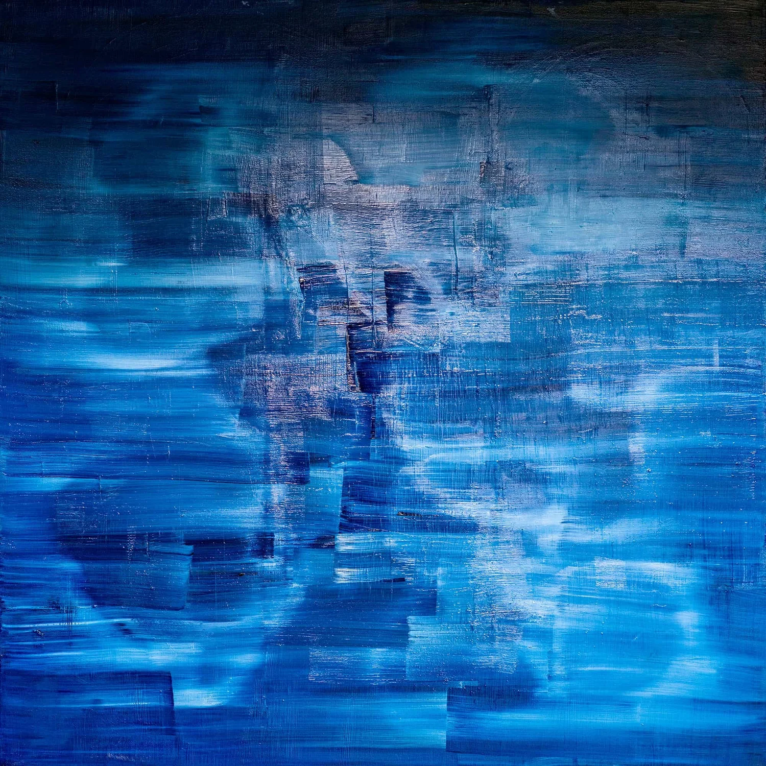 Architecture surfacing out of an atmospheric blue field