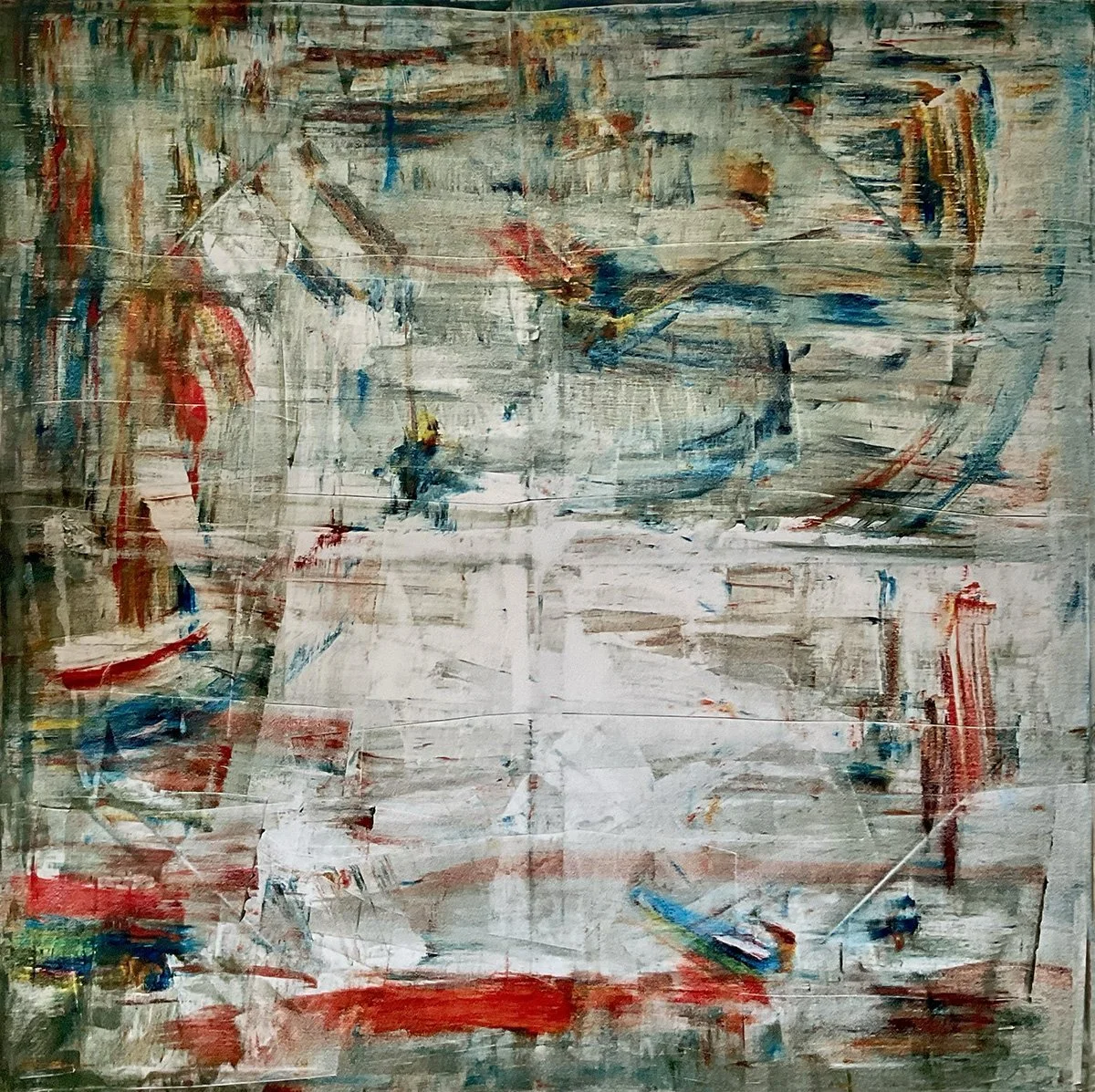 Thin scraped grey surface with red and blue incident