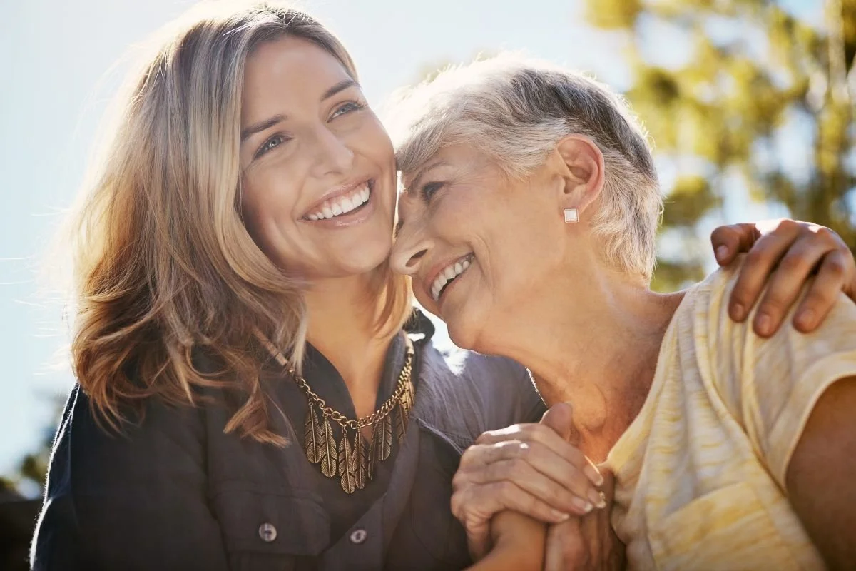 Mom and daughter hugging. A relational cord cleaning can release old wounds that accumulate throughout a relationship. Giving you the freedom to move forward and be in communion in a healthier way.