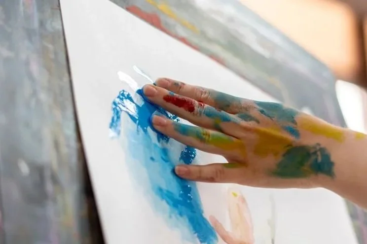 Hand finger painting. Creative and Expressive Healing allows you to bring forward deep wounds that may not be able to be expressed with words. Through an activity you can let go of the mind and trying to understand why the energy is trapped.