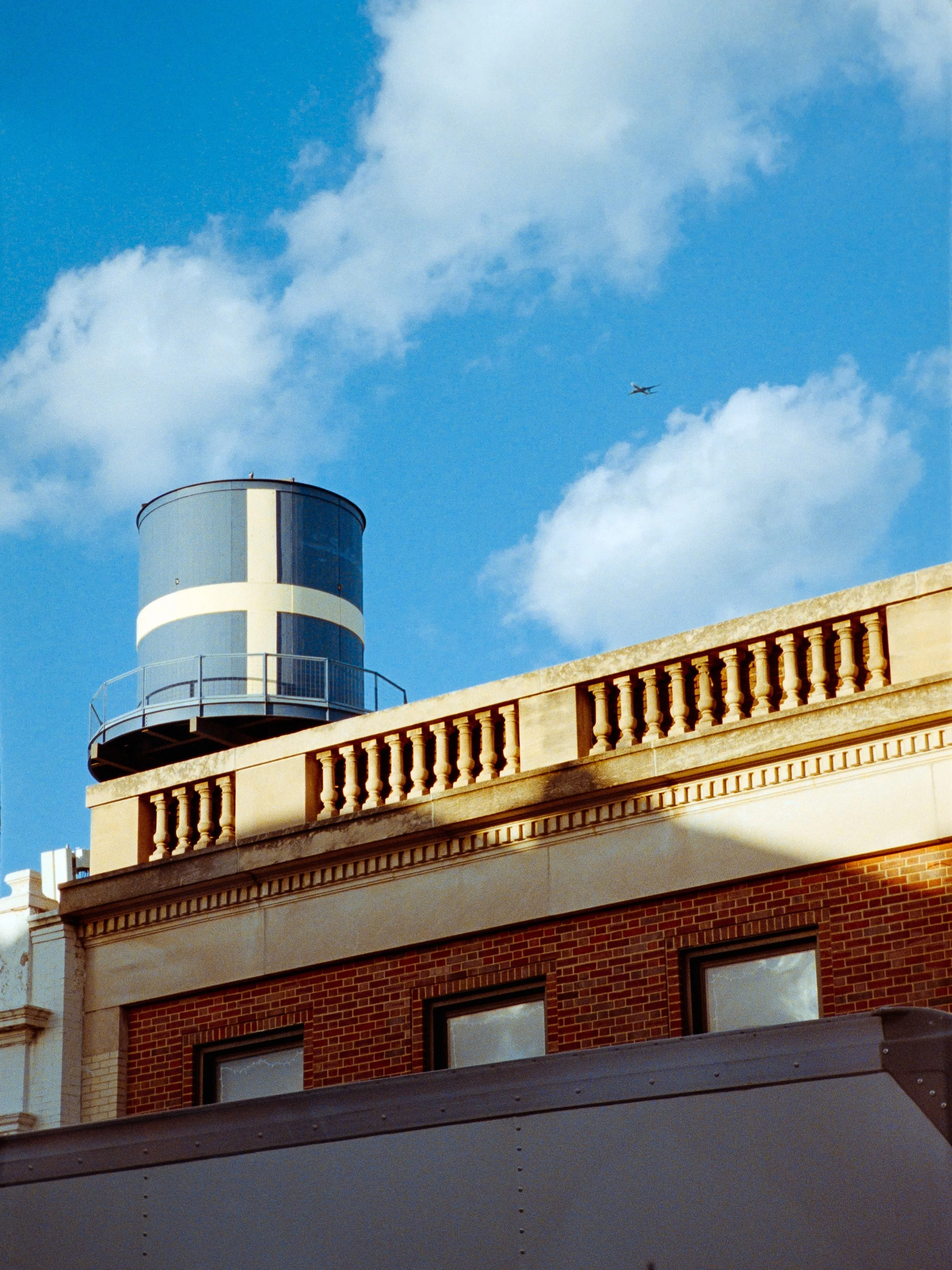 Andersonville + Avondale ✌🏻 of my favorite neighborhoods. The Swedish Flag Water Tower stands tall on Clark street and some cute stained glass I caught through a two flat while walking Willie in my neighborhood. Shot on film. I&rsquo;m trying. I&rsq