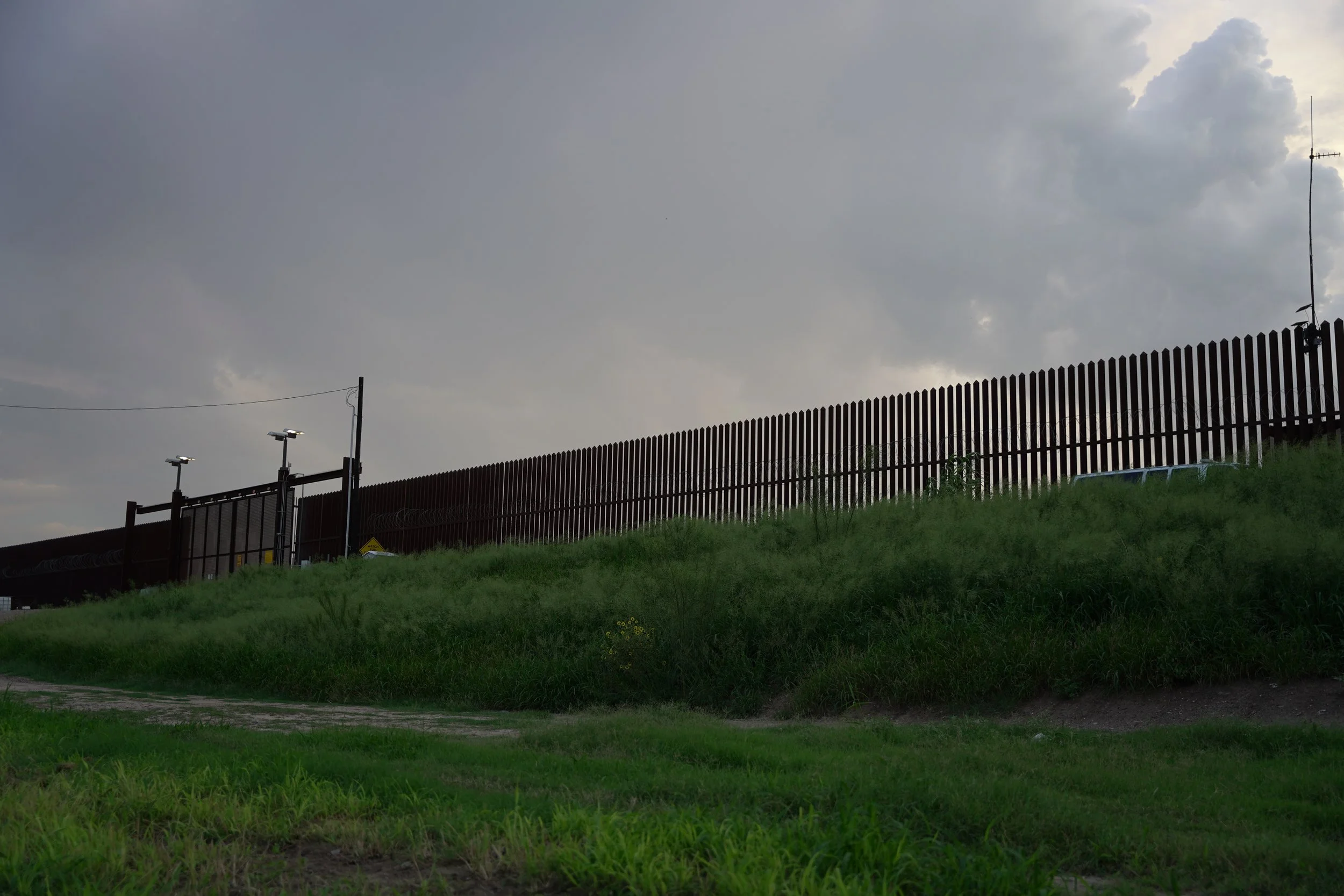 McAllen-Hidalgo International Bridge (US Side) (note: there is another non-visible border wall on the end of the tall border wall)