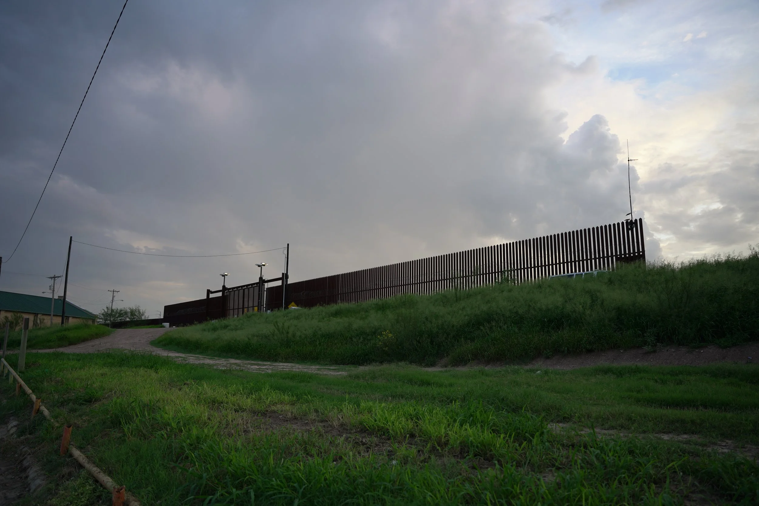 McAllen-Hidalgo International Bridge (US Side) (note: there is another non-visible border wall on the end of the tall border wall)