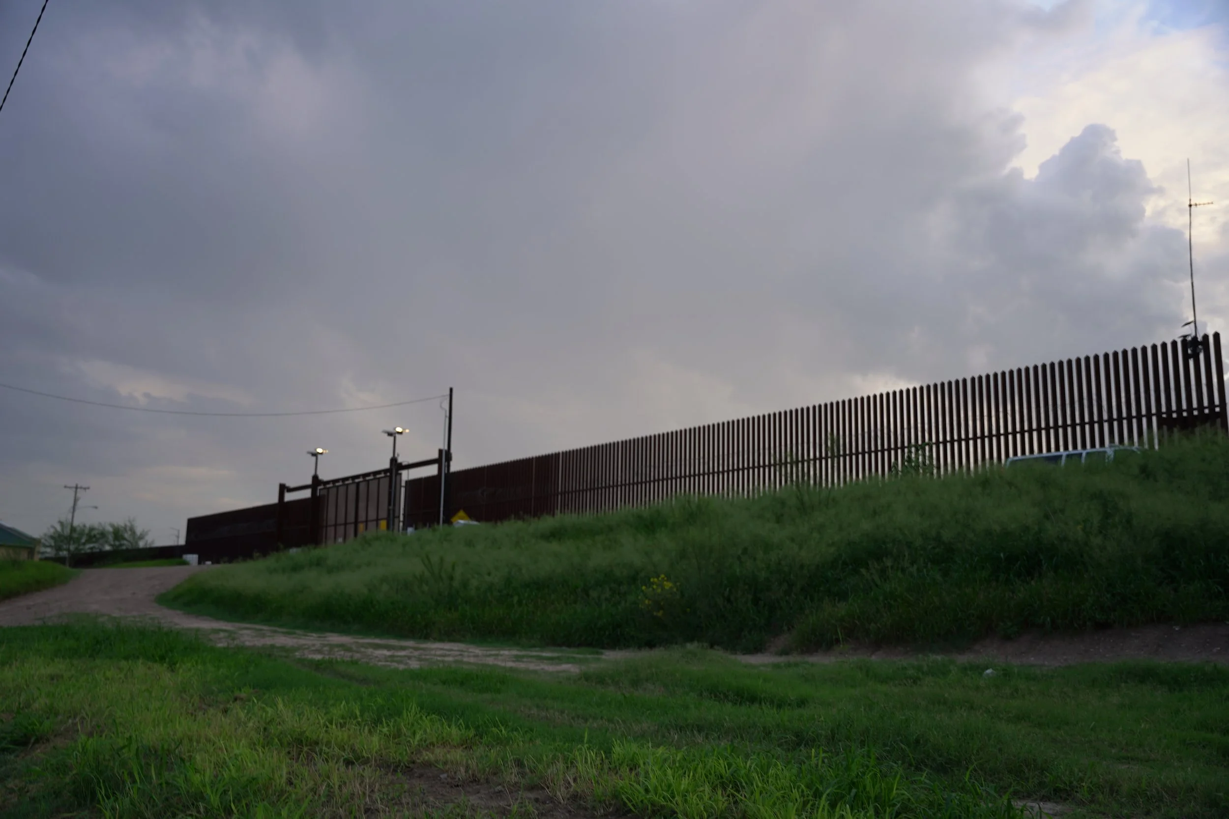 McAllen-Hidalgo International Bridge (US Side) (note: there is another non-visible border wall on the end of the tall border wall)