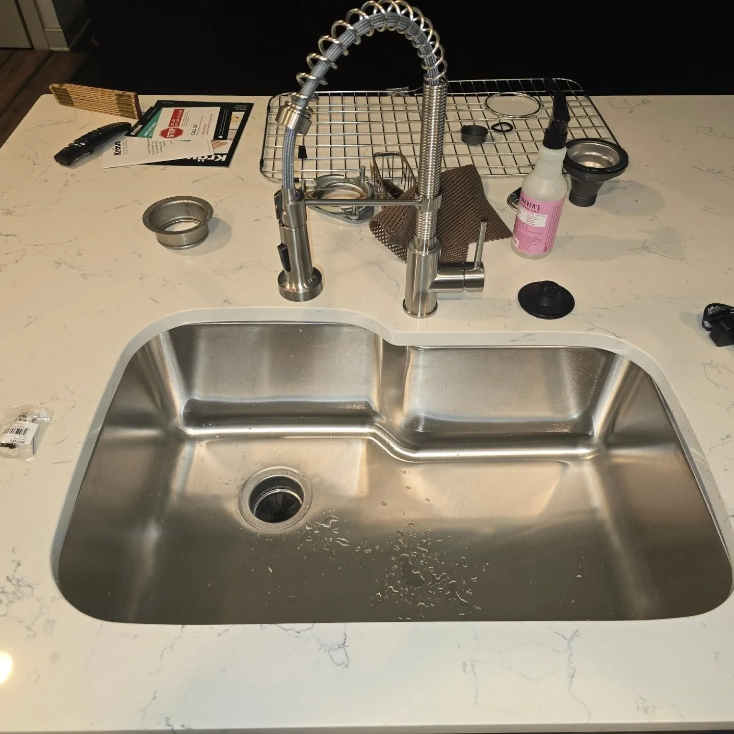 After and before of a kitchen sink and faucet swap. The customer was quoted $2900 just to demo the existing sink and replace the sink and faucet. The other company wasn't even going to redo the drain connections and the customer would have had to hir