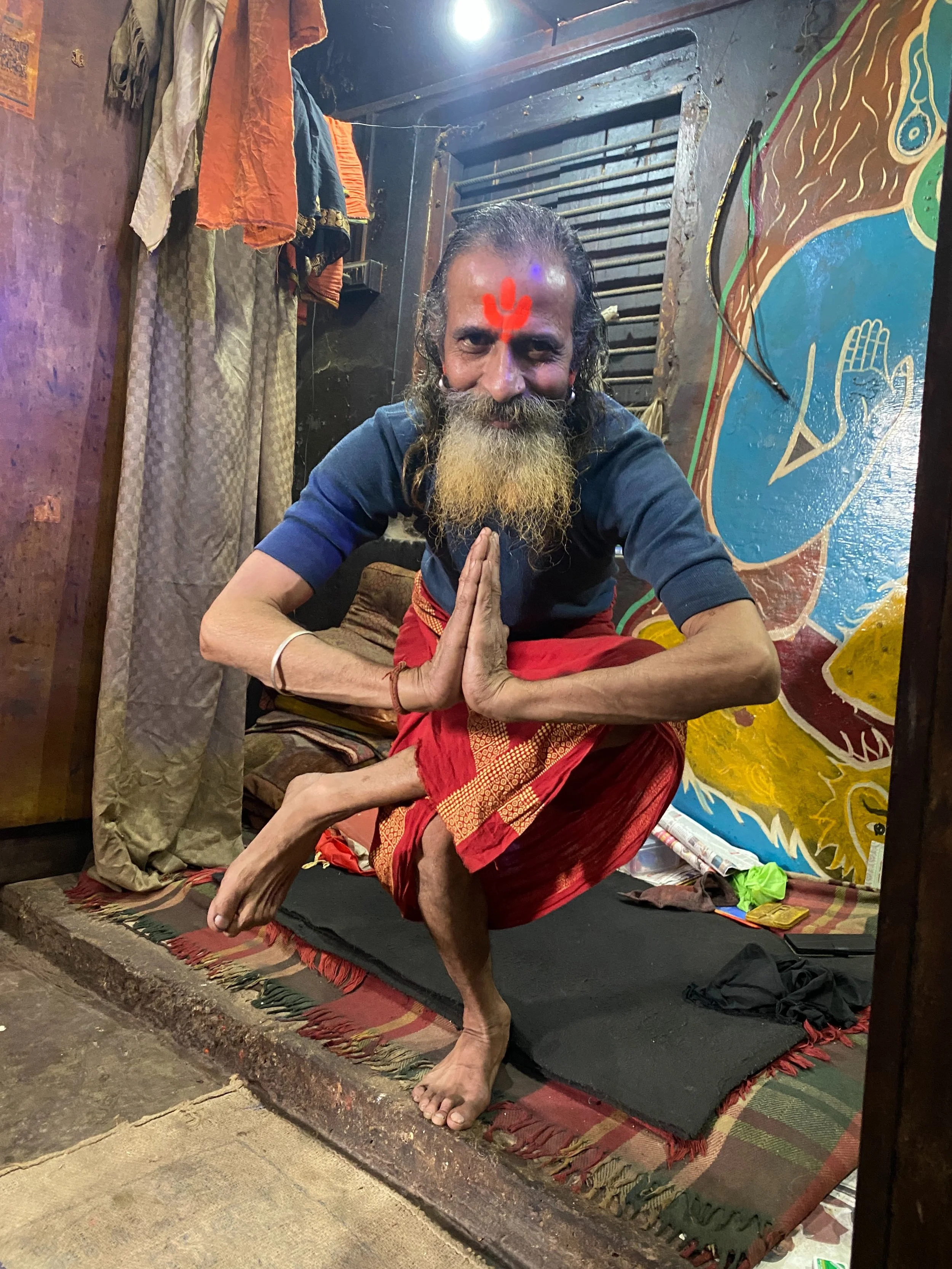 i only stopped to look at an 800-year-old tree.
i stayed for over six hours.

inside the little temple beside it was santosh. years ago, he left his university job to care for this place, and every evening since, people have gathered here to pray and