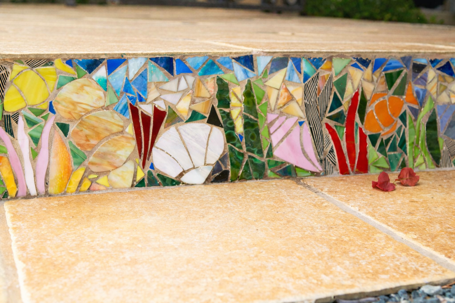 Colorful mosaic with red petals.png