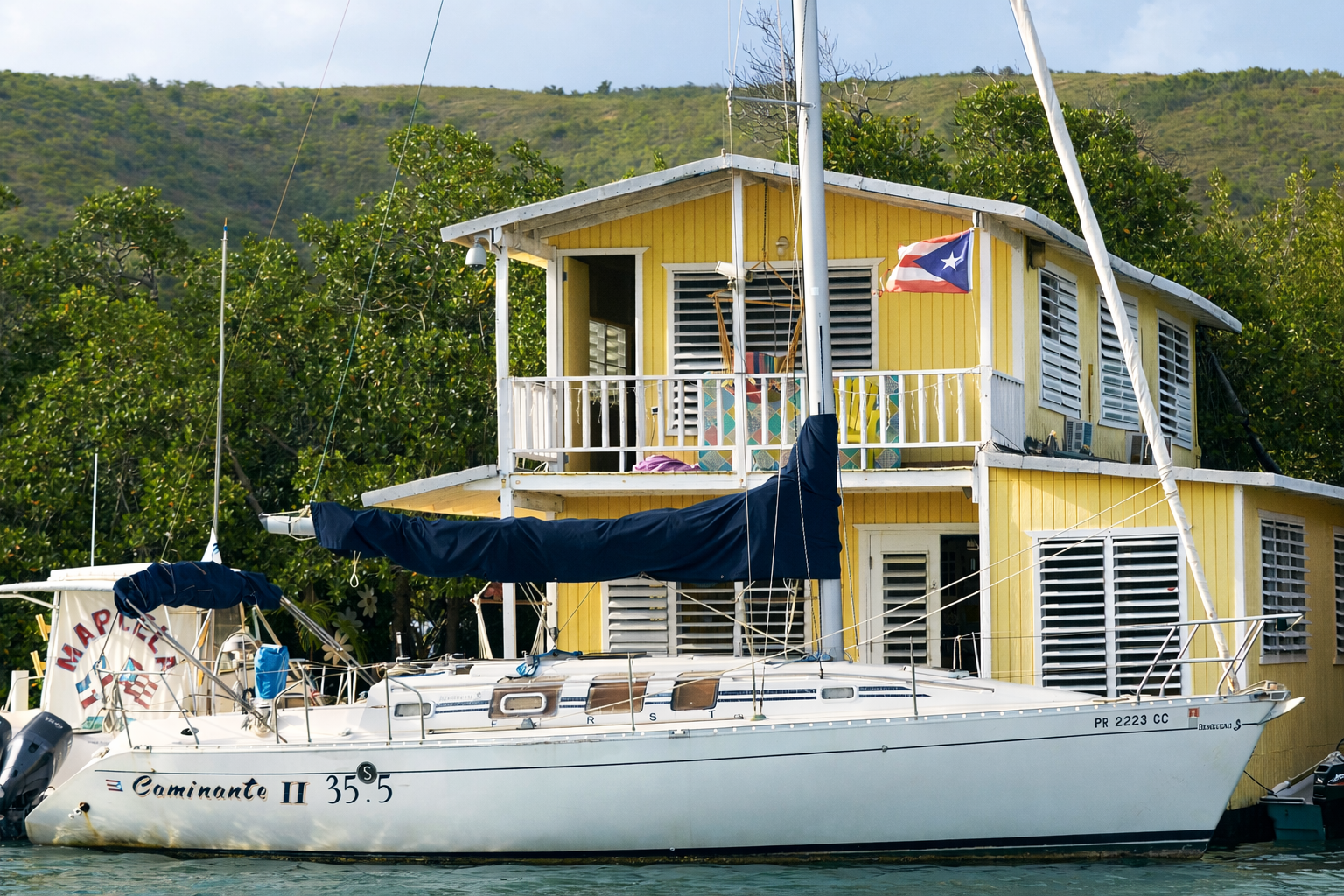 Yellow house by turquoise waters.png