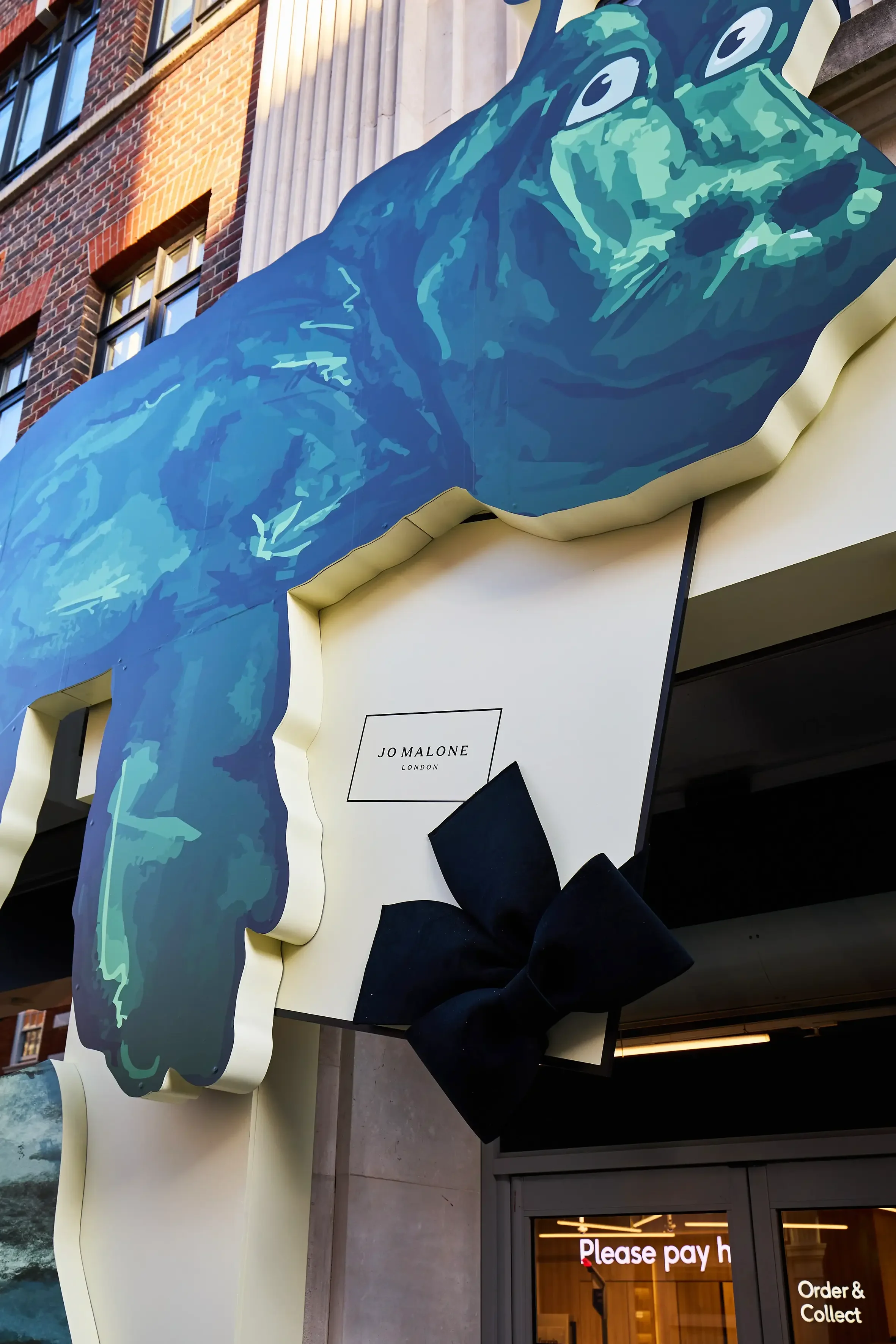 A Sea Monster installation on the from of the Boots Flagship in Covent Garden