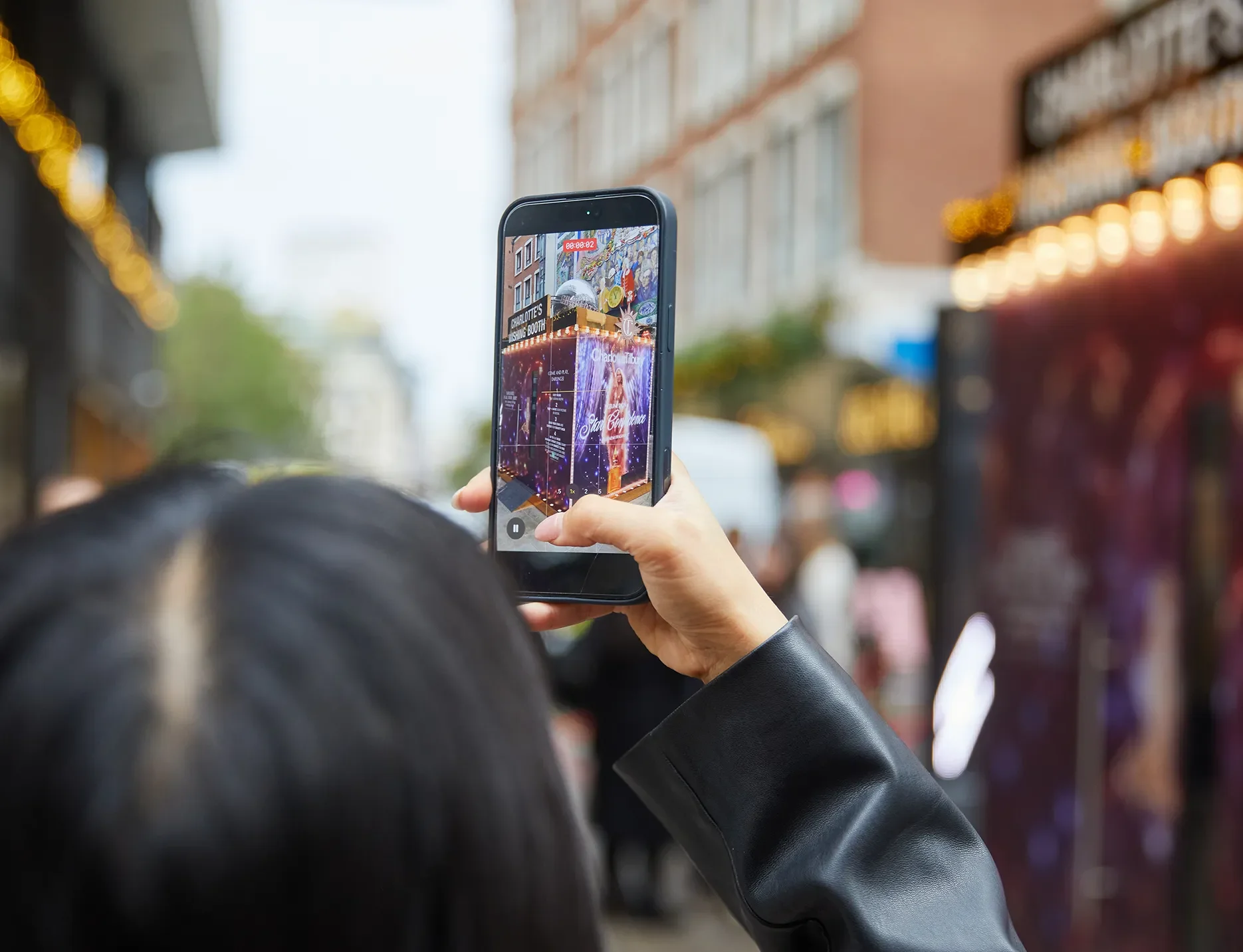 Charlottte Tilbury, Photobooth, Someone taking a photo of the booth