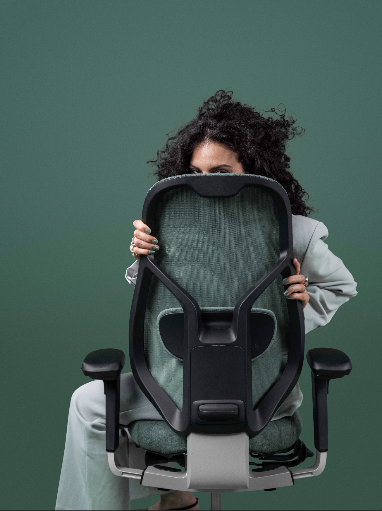 Designed office chair in a blue-green colour
