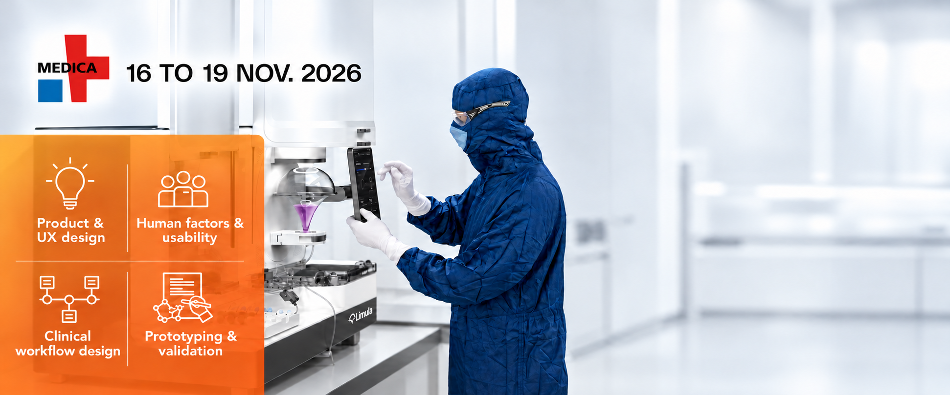 A lab technician in blue santized overalls presses buttons on the digital control panel of a medical device