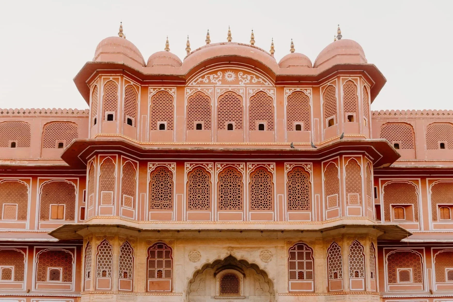 Pink sandstone building with domes