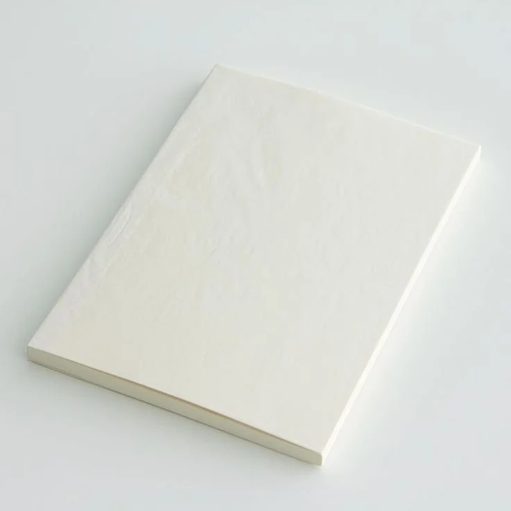 White notepad on white surface