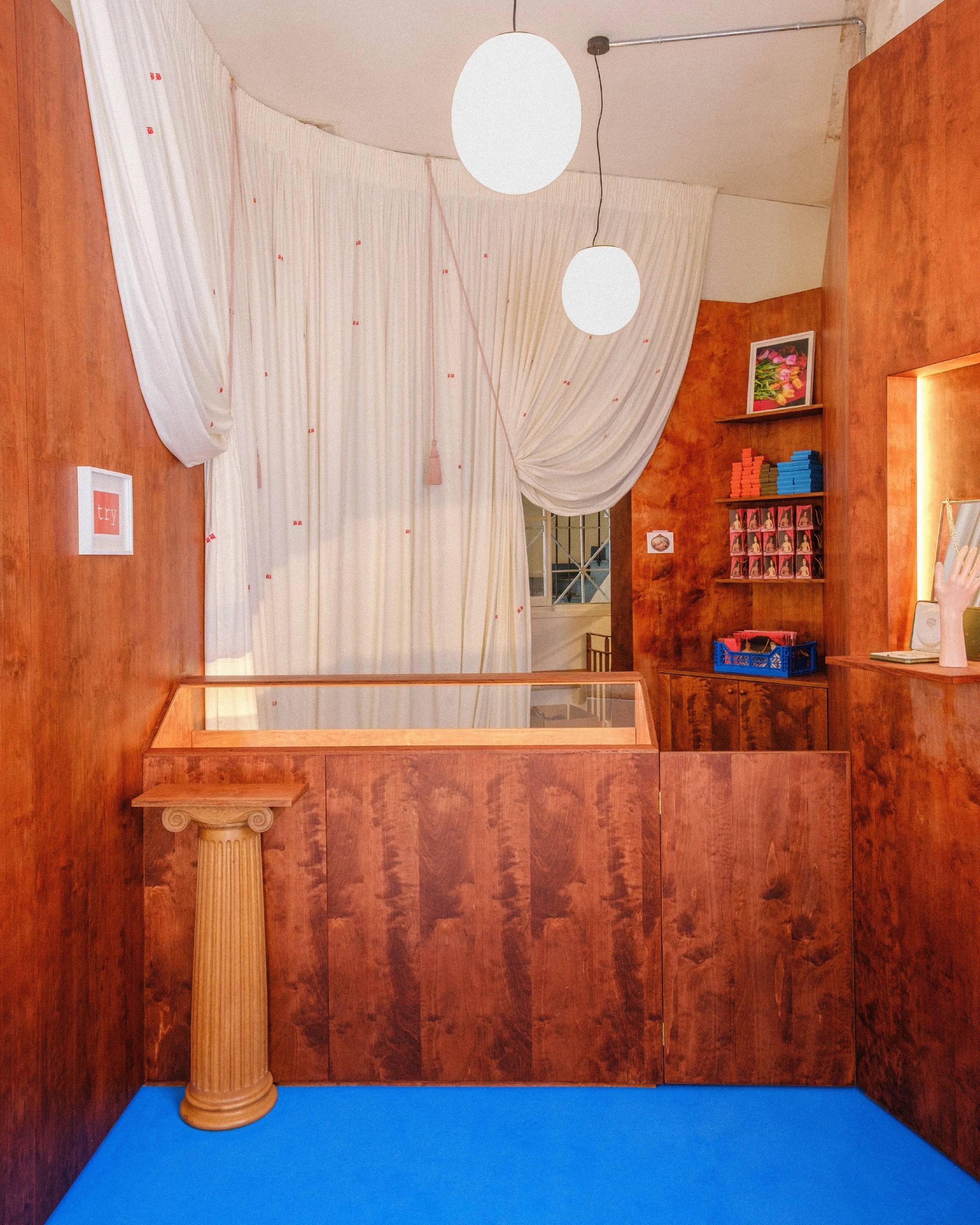 Wood-paneled room with display shelves