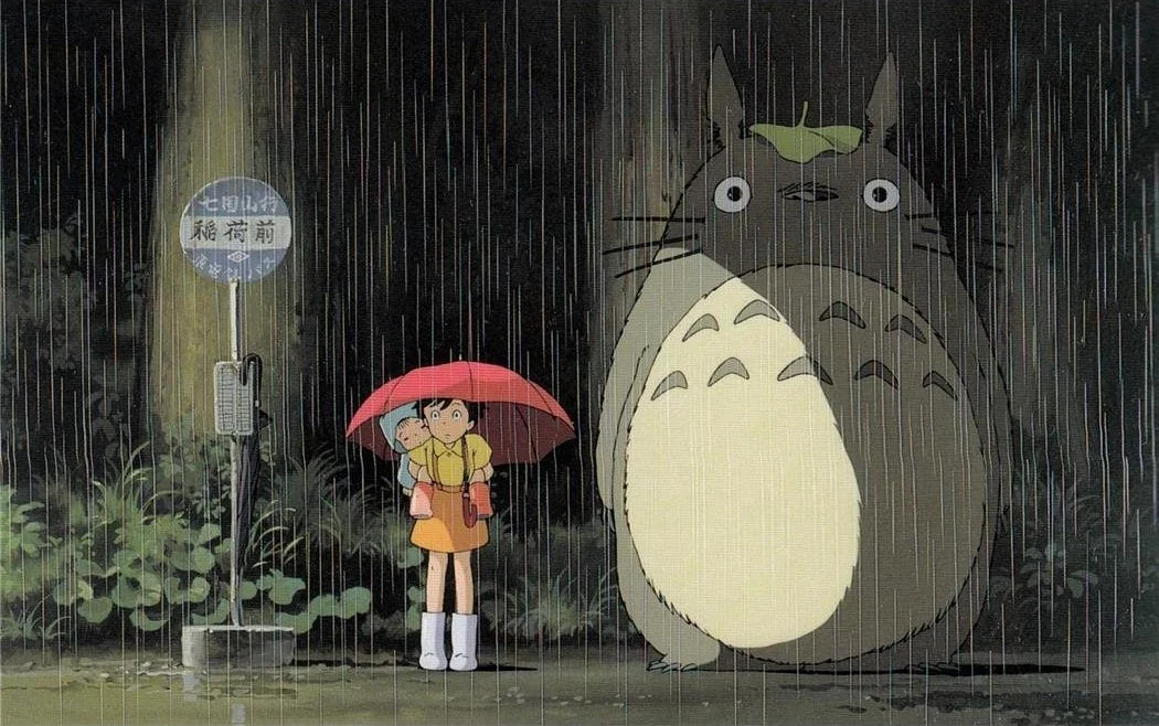 Film still: Totoro at rainy bus stop