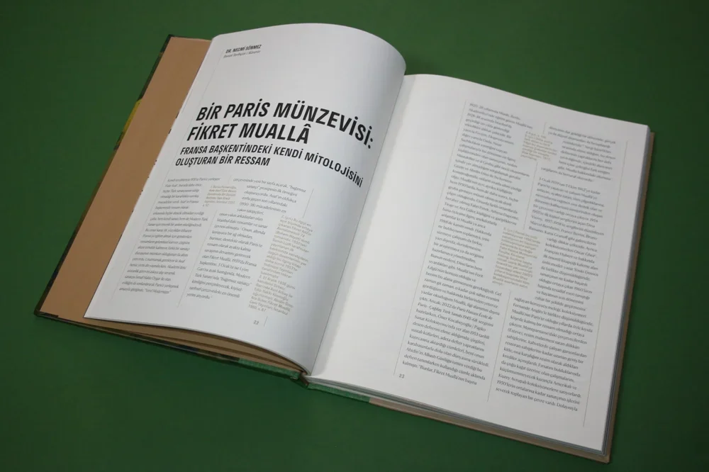 Open magazine spread — Turkish text