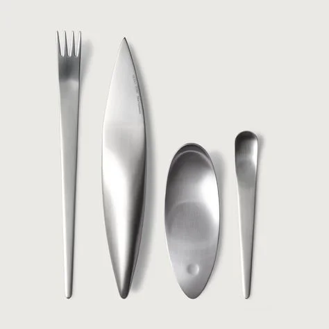 Stainless steel cutlery set on white background