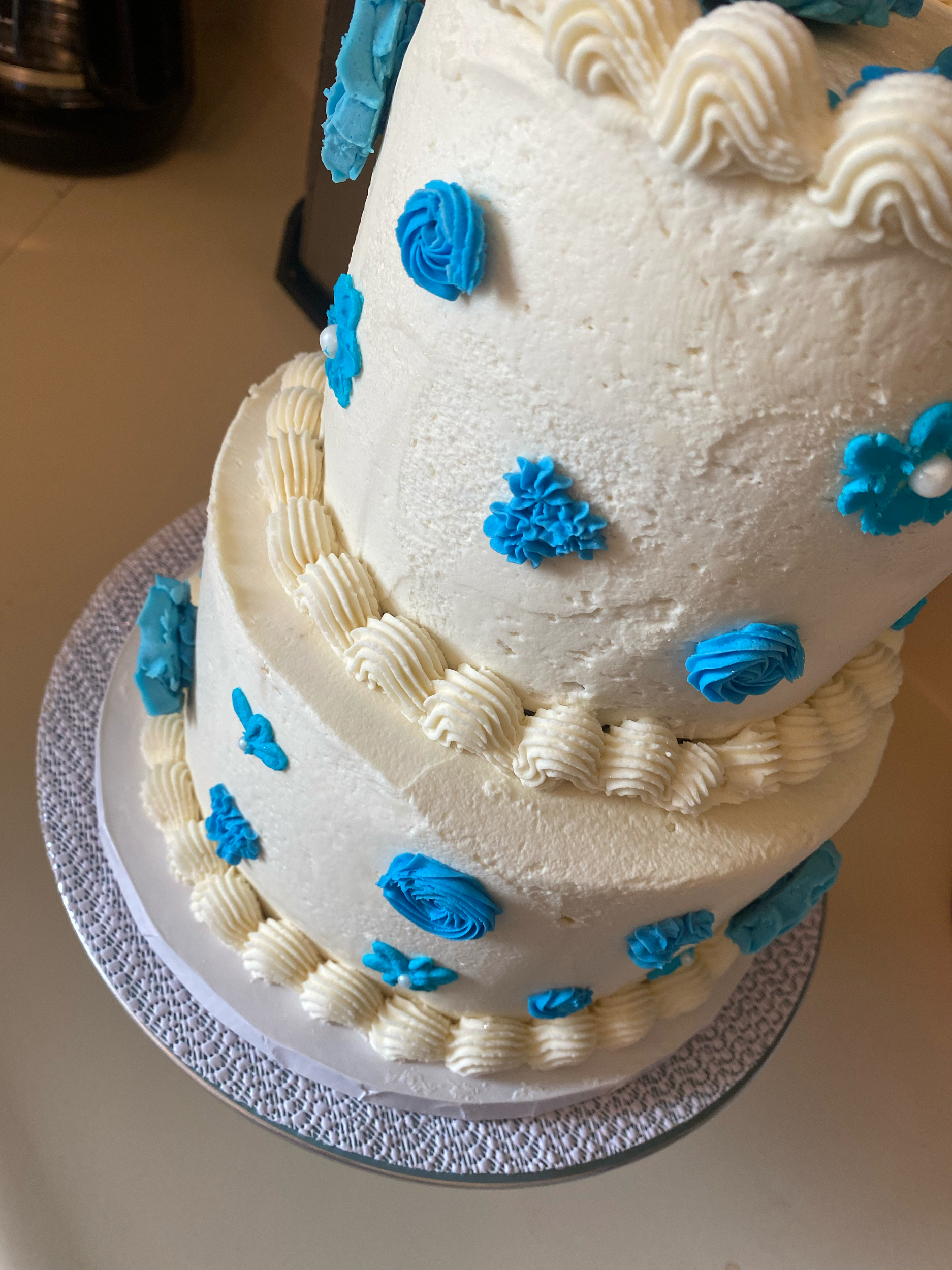 Close up of floral wedding cake