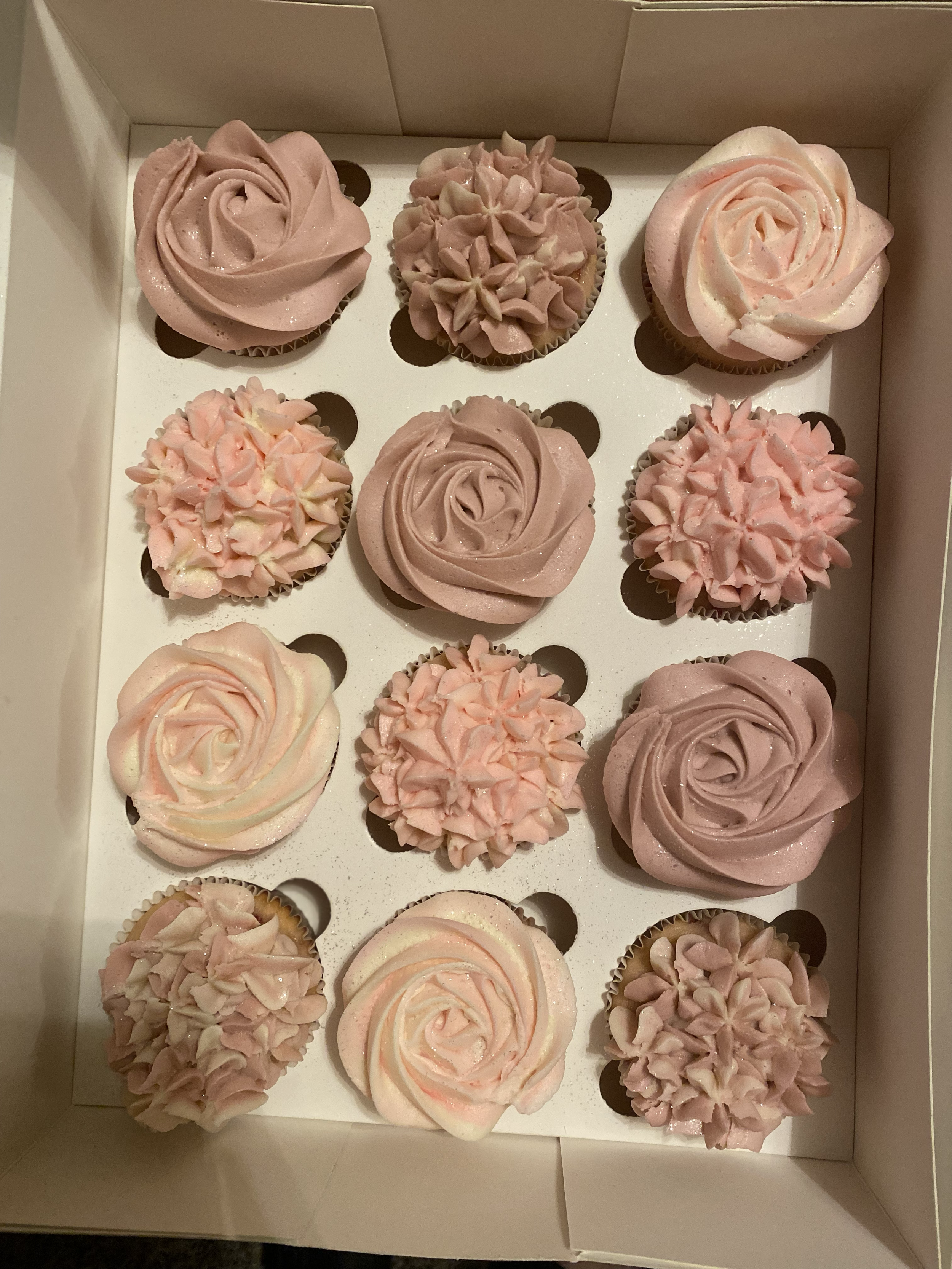 Assorted cupcakes decorated like flowers