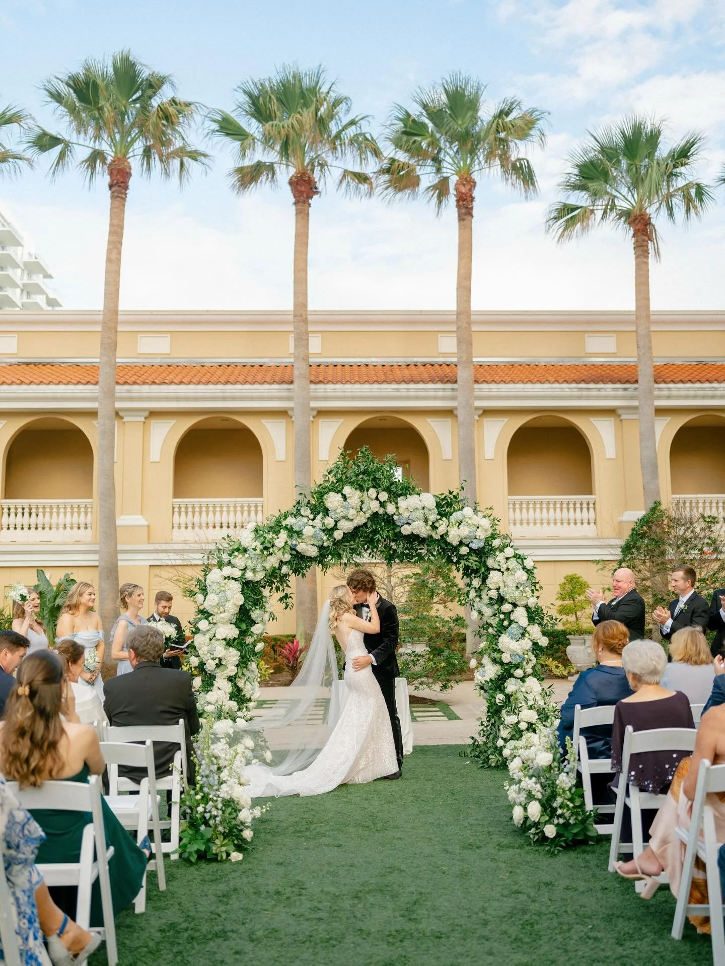 Love is in the air✨🕊️🥂🤍
&bull;
&bull;
&bull;
&bull;
Planning + Design: @thelisalyons
Venue: @ritzcarltonsarasota
Photography: @bethjoyphoto
Videography: @storybook_films
Floral: @benevaweddings
Ceremony Arch: @swankysoireeevents
Hair + Makeup: @po