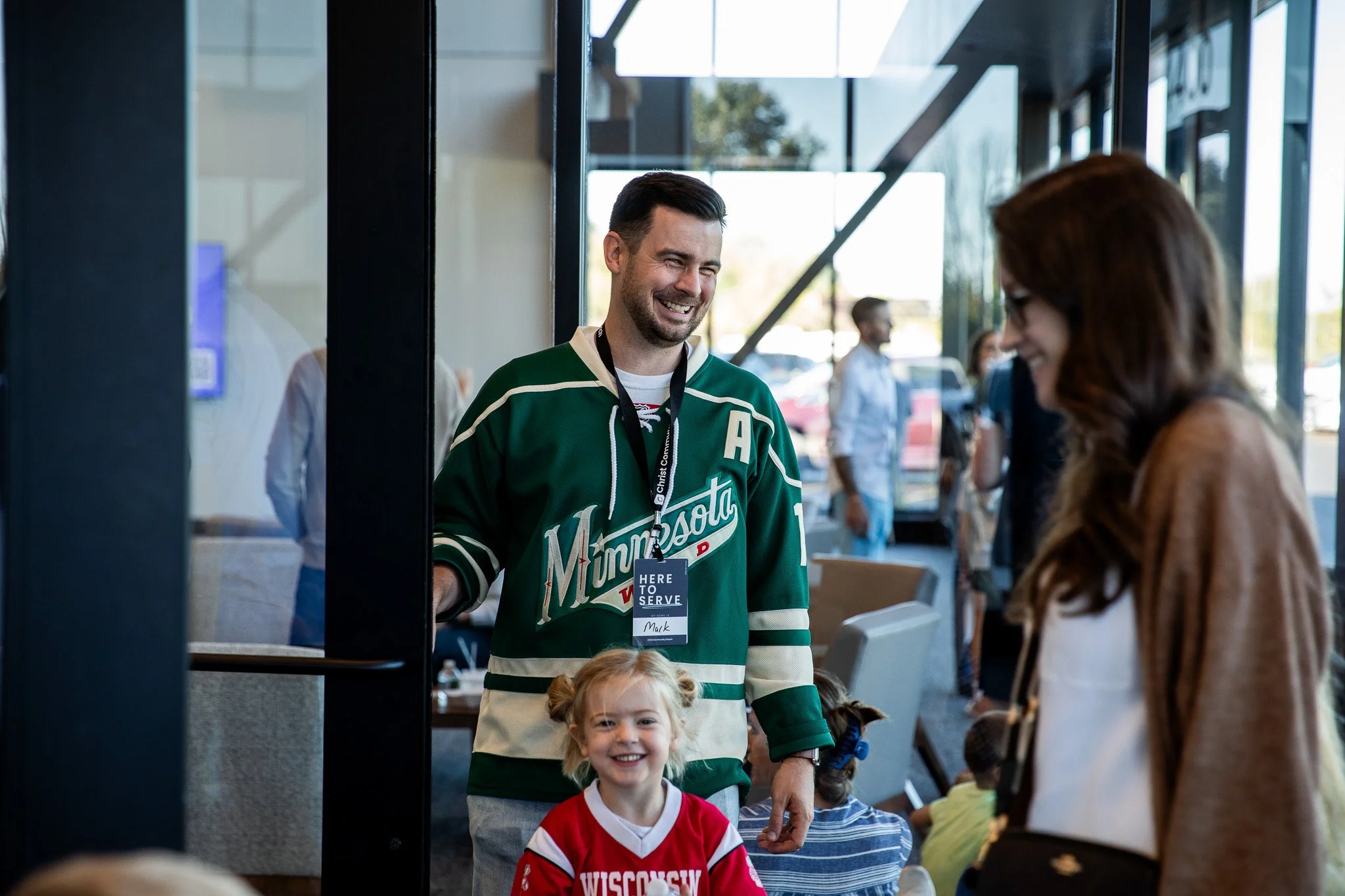 Woman greeting at the door