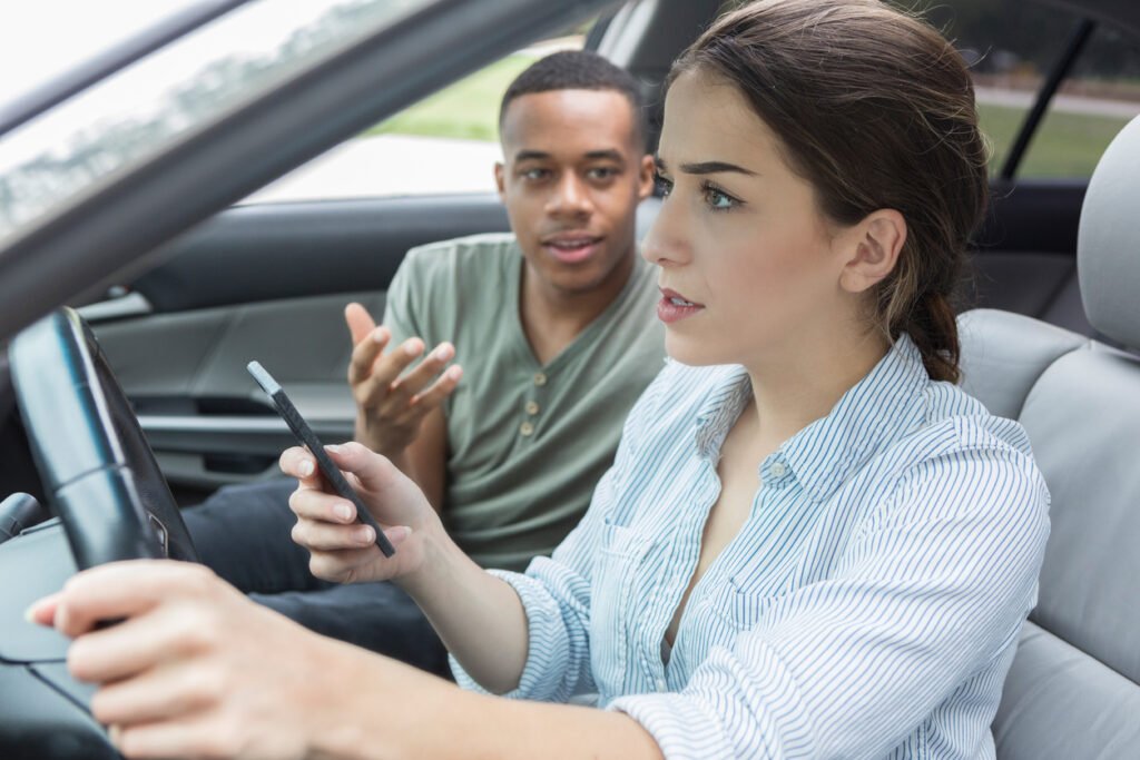 Distracted-driver-ignores-passengers-warning-877029690_1258x838-1024x683.jpeg