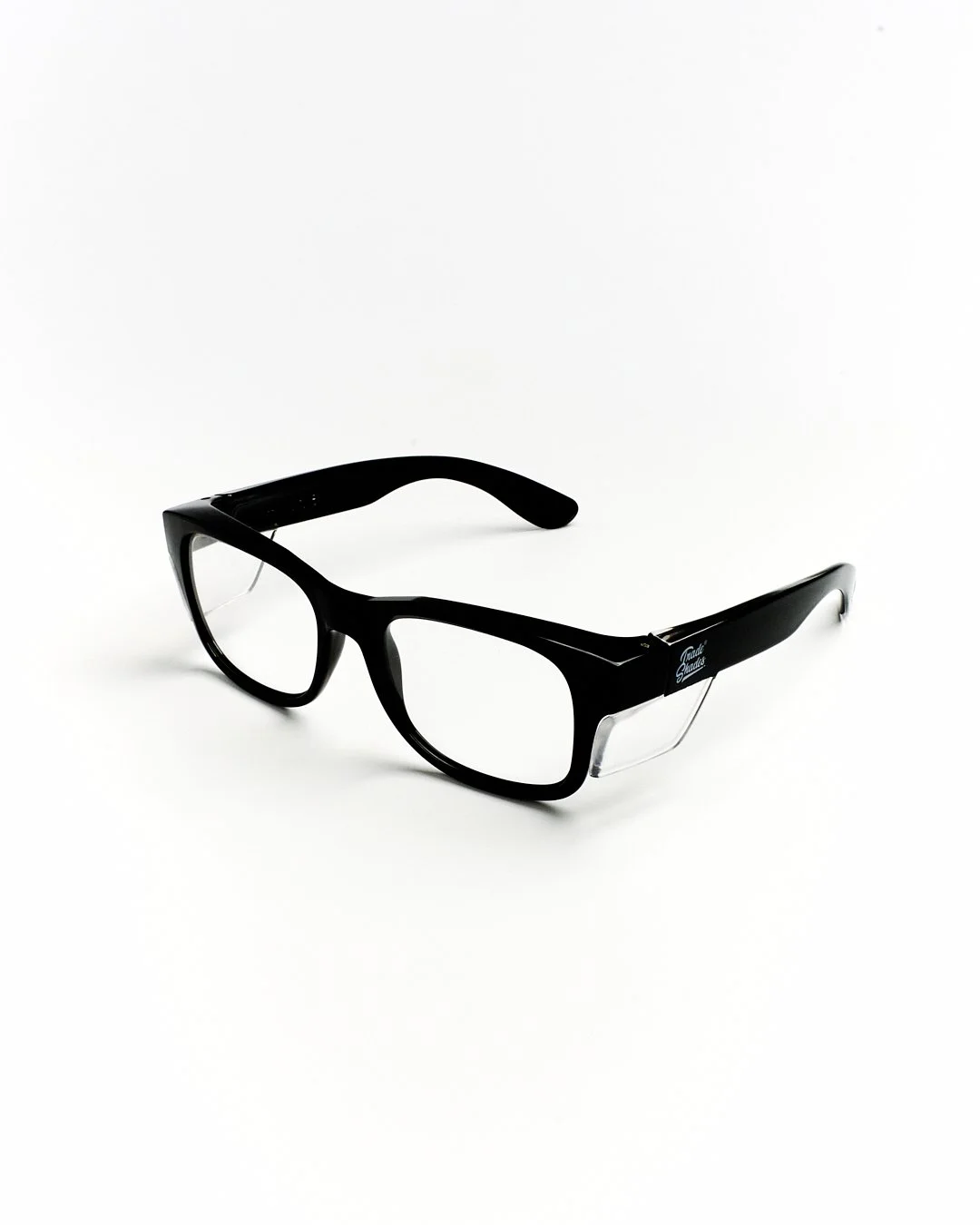 Black and clear glasses with a thick black frame on a white background