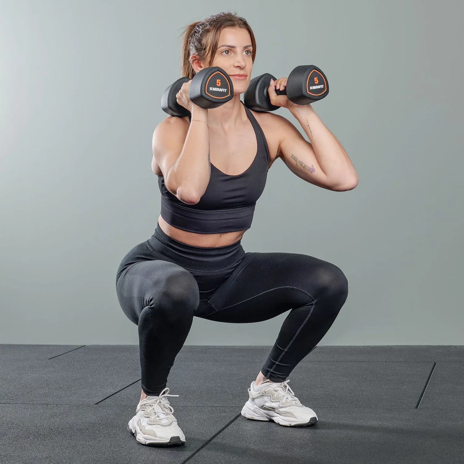 Front-Squat-using-Mirafit-5kg-Studio-Dumbbell-Hand-Weights_1.webp