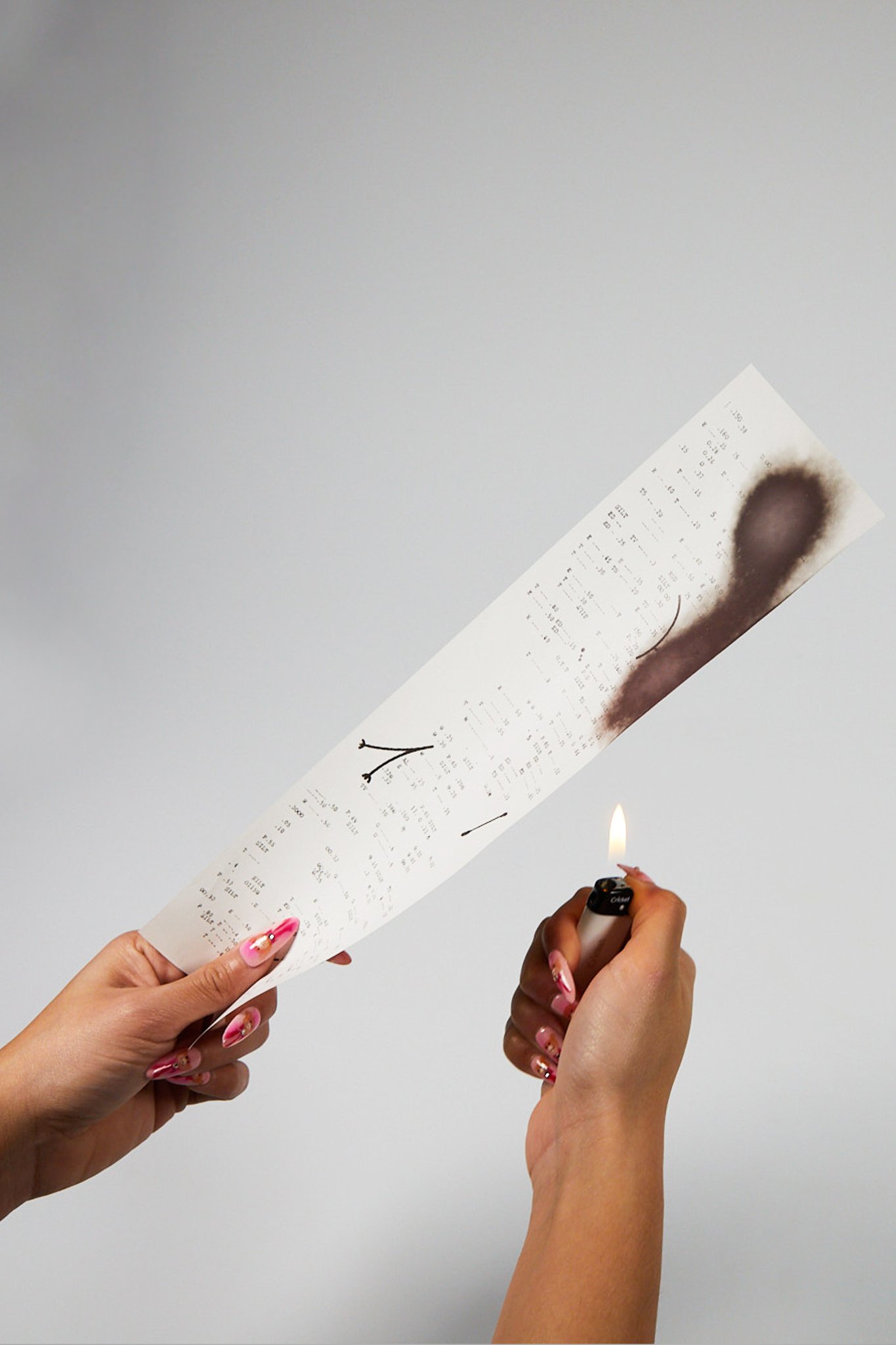 thermal recipet paper reacting to heat.