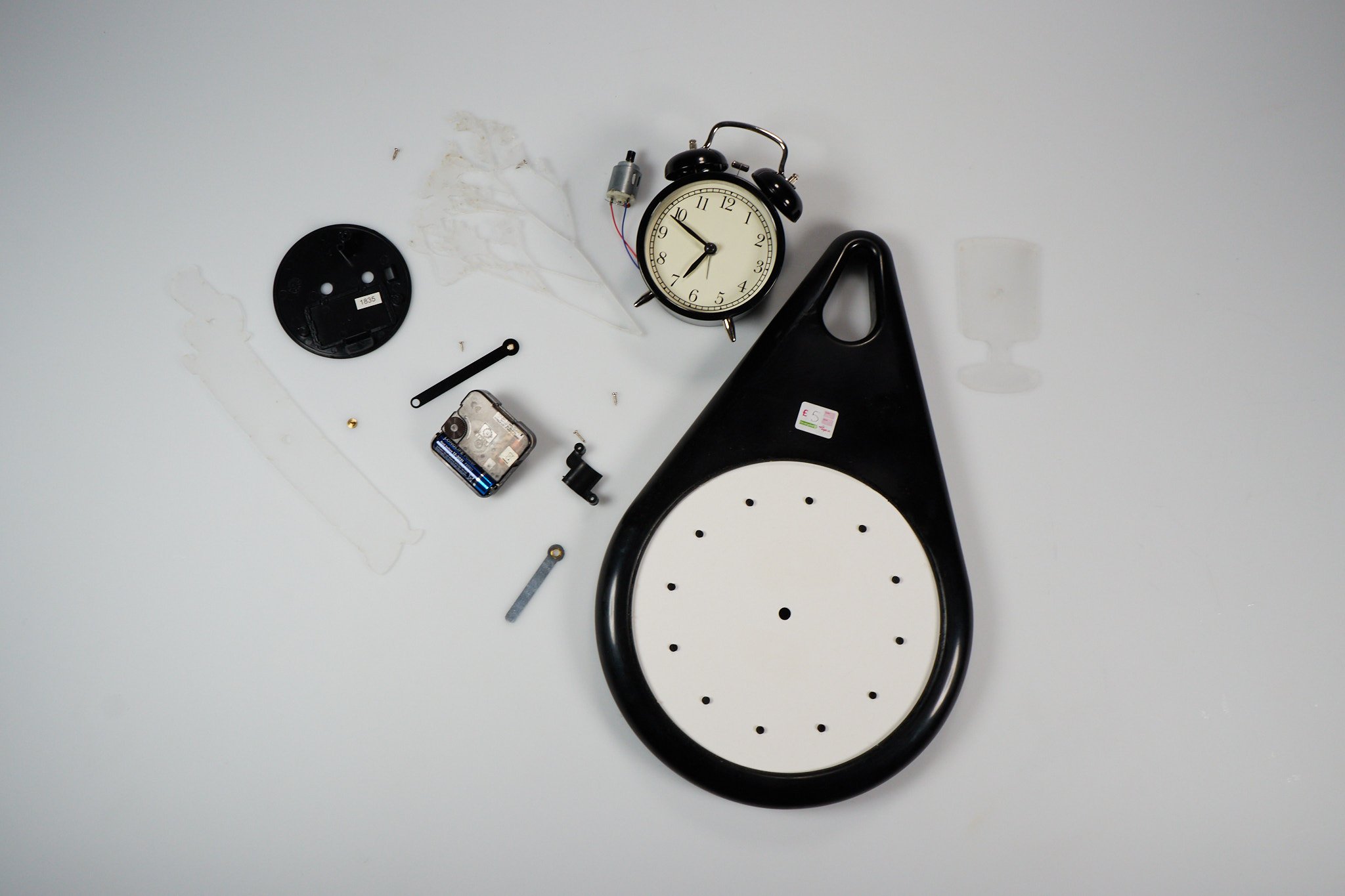 upcycled charity shop clocks & blank acrylics used in installation. various sizes