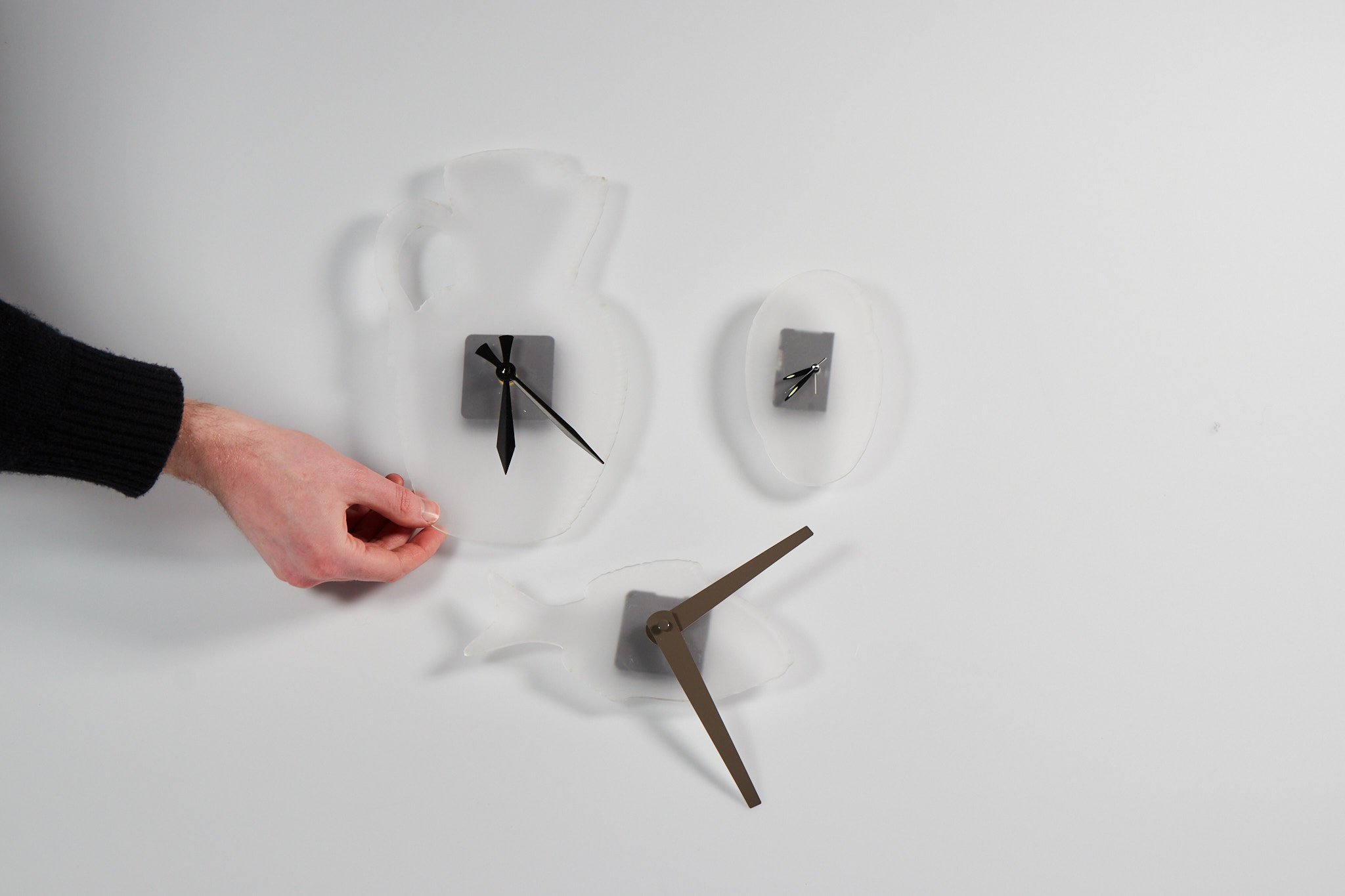 laser cut acrylic clocks with upcyled mechanisms. various sizes.