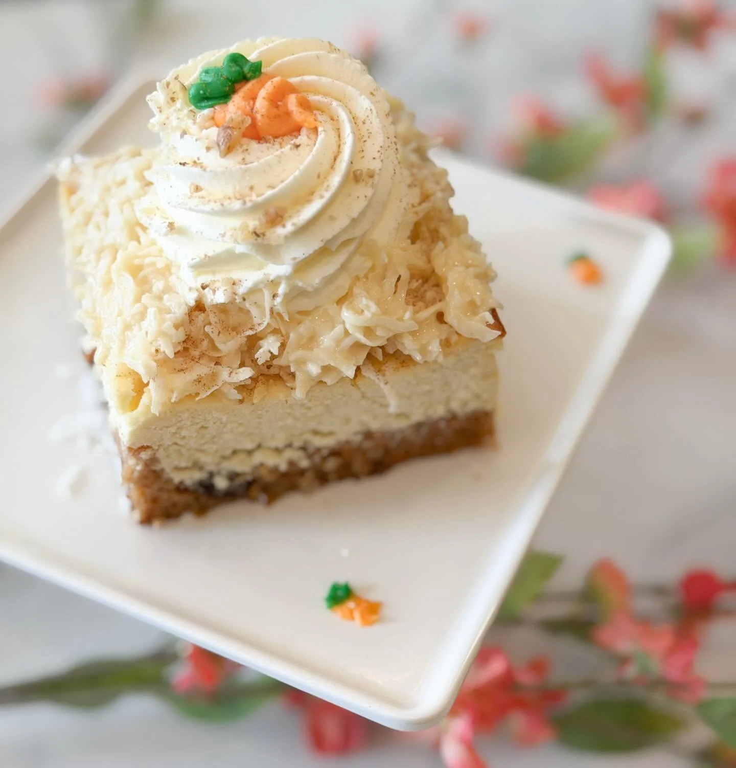 The best of our dessert worlds collide for one week only! Carrot cake meets Cheesecake. This incredible cheesecake sits atop our famous carrot cake, a to die for creamy coconut layer and fresh whipped cream.