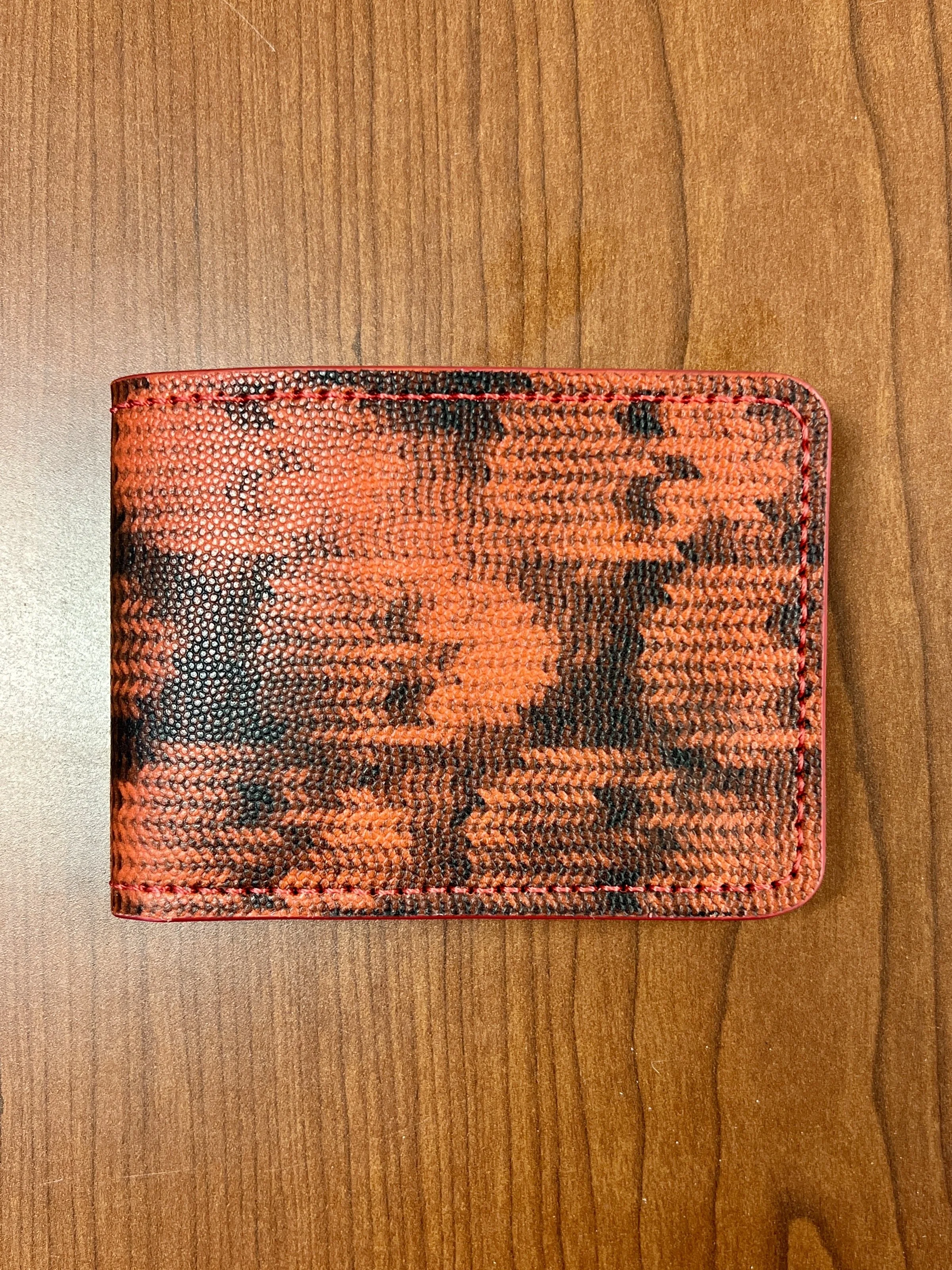 Finished leather mask, handcrafted maroon hood, artisanal superhero gear, white hand-stitched webbing