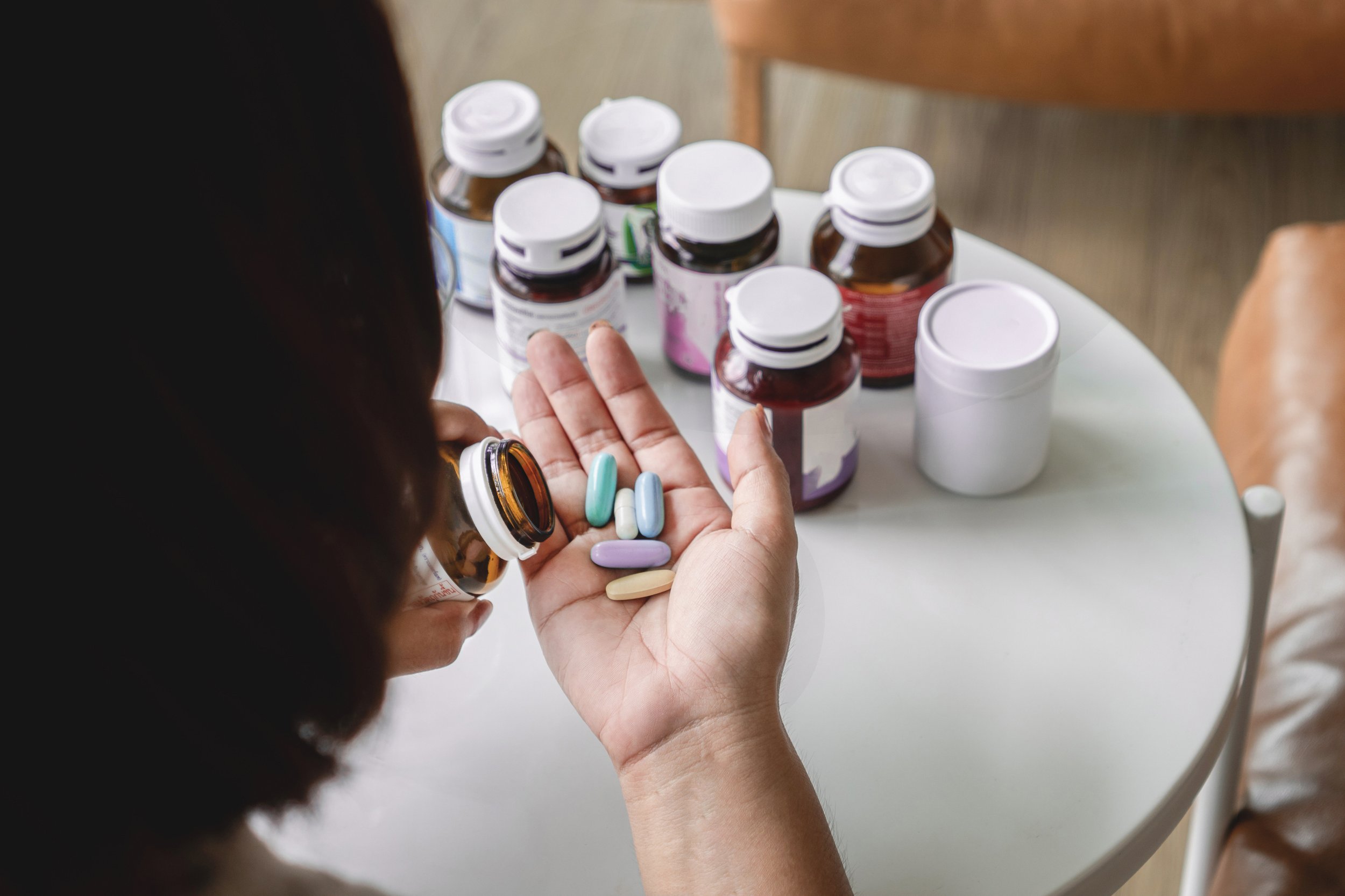 Man holding supplements