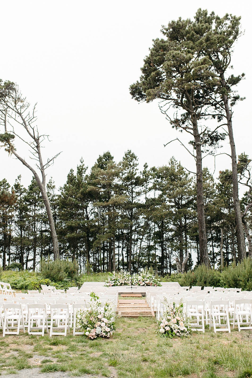 Scenic event venue with on-site lodging in the coastal forest of Mendocino Grove.