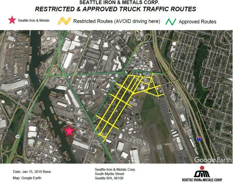 Map of restricted and approved truck routes in Seattle Iron & Metals Corp. area, showing approved routes in green, restricted routes in yellow, and the location of Seattle Iron & Metals marked with a pink star, along with nearby streets and waterways.