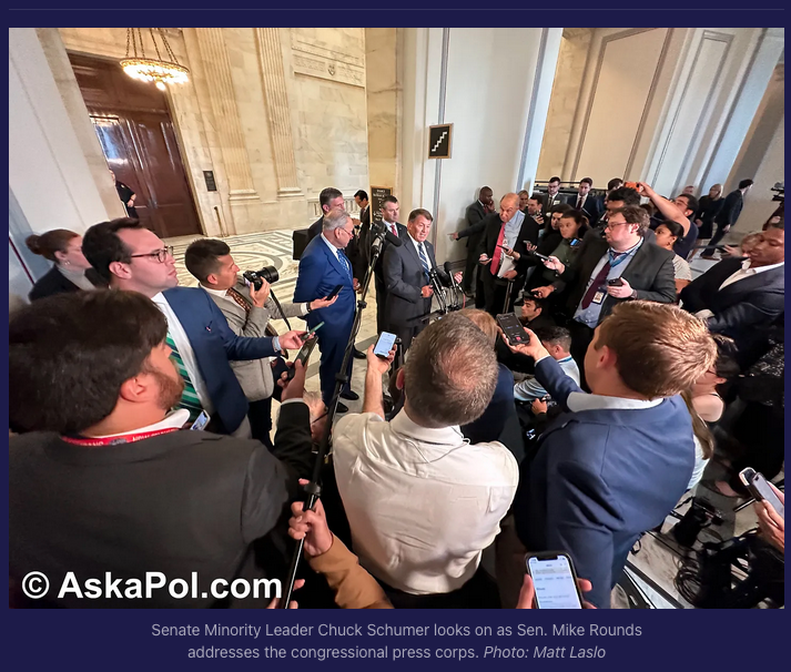 US Senators address a large throng of congressional reporters at US Capitol