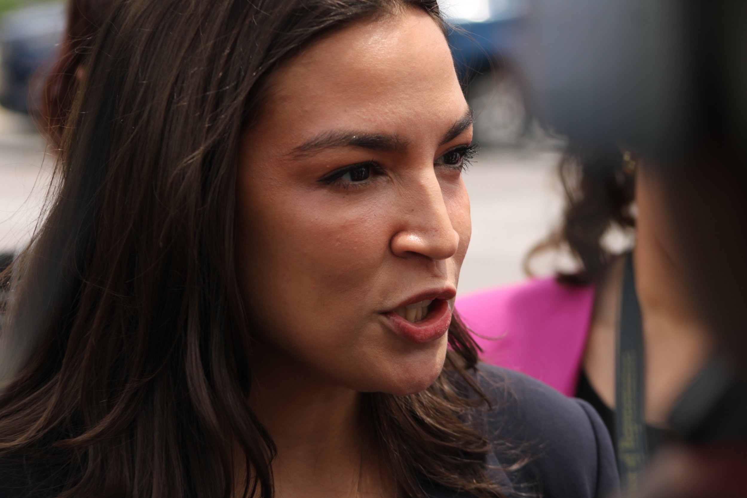 Rep. AOC talks at the Capitol