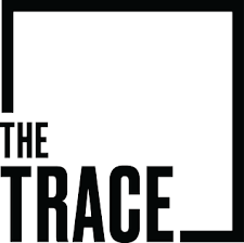 "The Trace" logo in black text with a partial square border on a white background.
