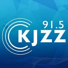 KJZZ 91.5 logo on a blue background