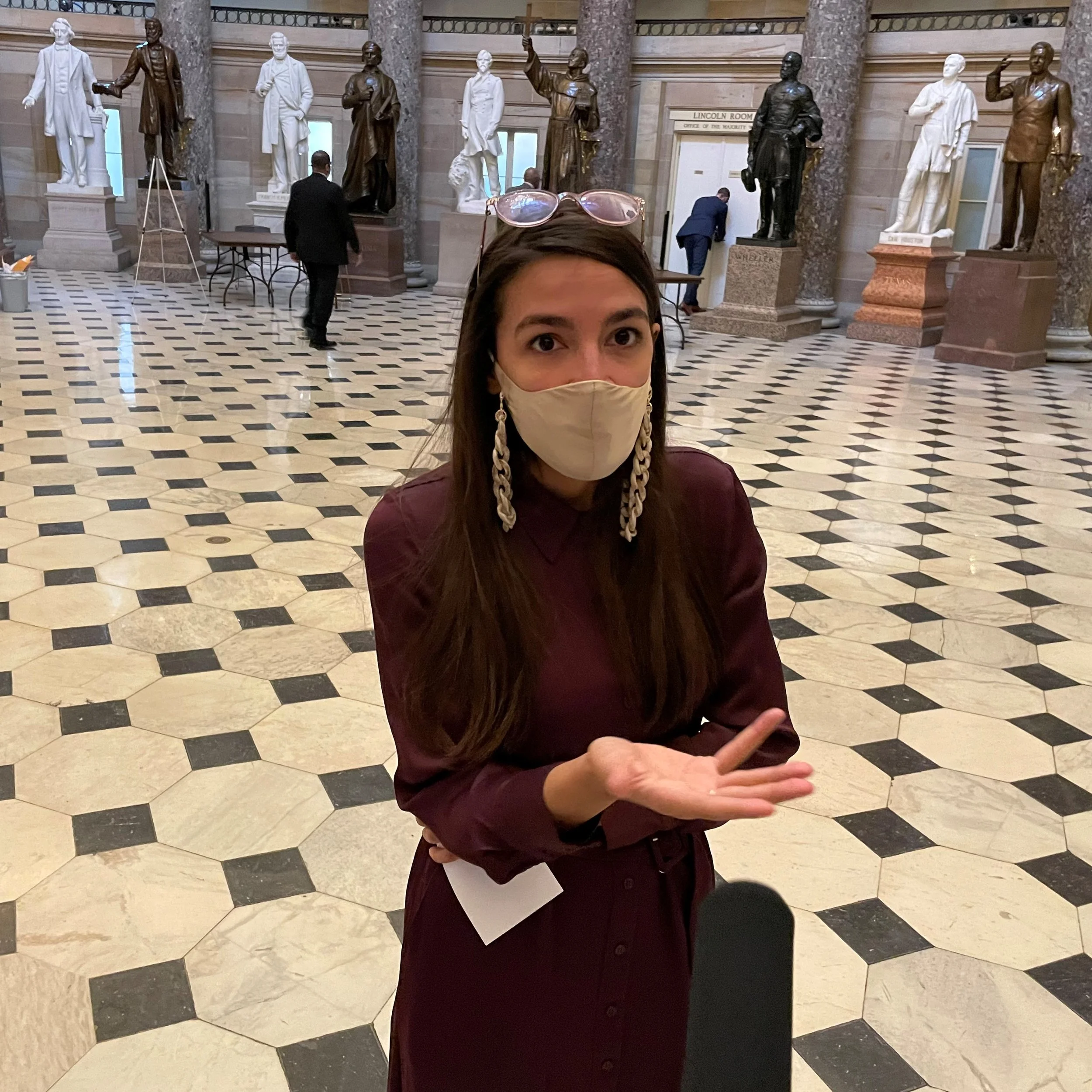 Rep. Alexandria Ocasio-Cortez speaks with Matt Laslo in the US Capitol during COVID pandemic.