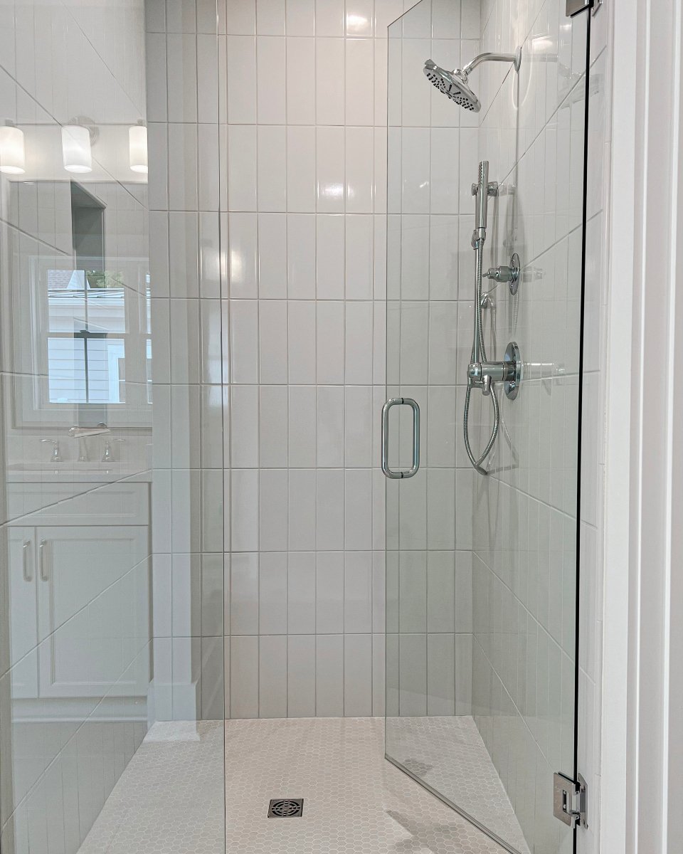 When working with clients, we believe every element in a home should serve both form and function&mdash;and this glass-enclosed shower does exactly that. Designed with simplicity and elegance in mind, it enhances the bathroom's overall aesthetic whil