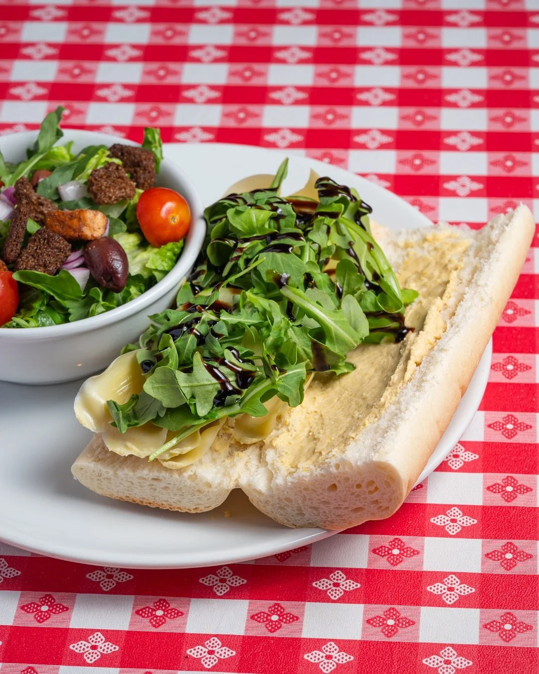 Discover this hidden gem: Veggie Sandwich Edition

Think you know Gino&rsquo;s? There&rsquo;s more to our menu than deep dish. Our Veggie Sandwich is a hidden gem&mdash;stacked with hummus, roasted red peppers, artichoke hearts, cucumber, arugula, an