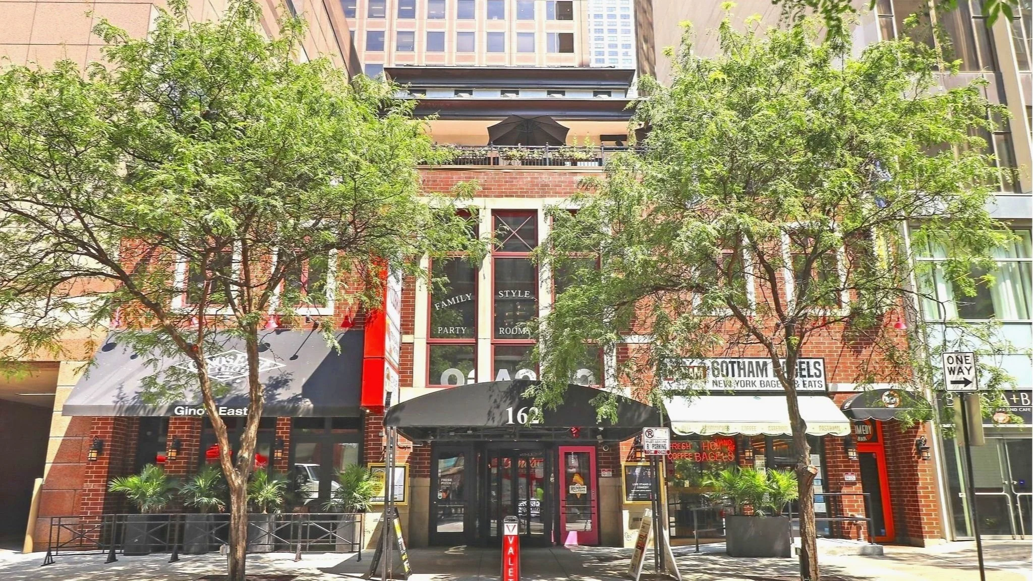 Street view of a brick building Gino East