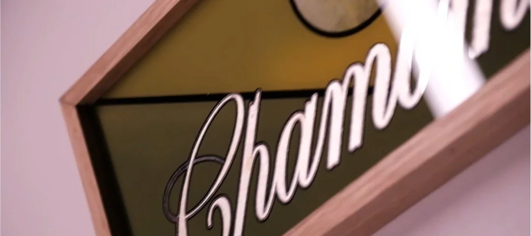 Timber-frame-glass-house-sign-silver-mirror-header-store-still.jpeg