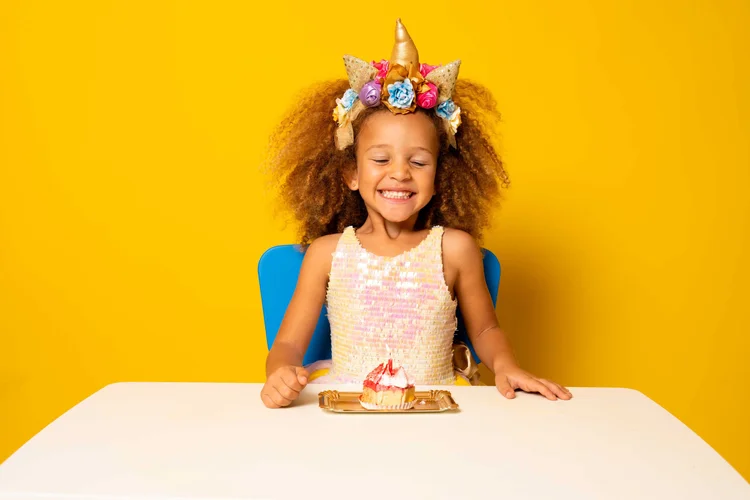 Unicorn-themed birthday party setup with pastel decorations